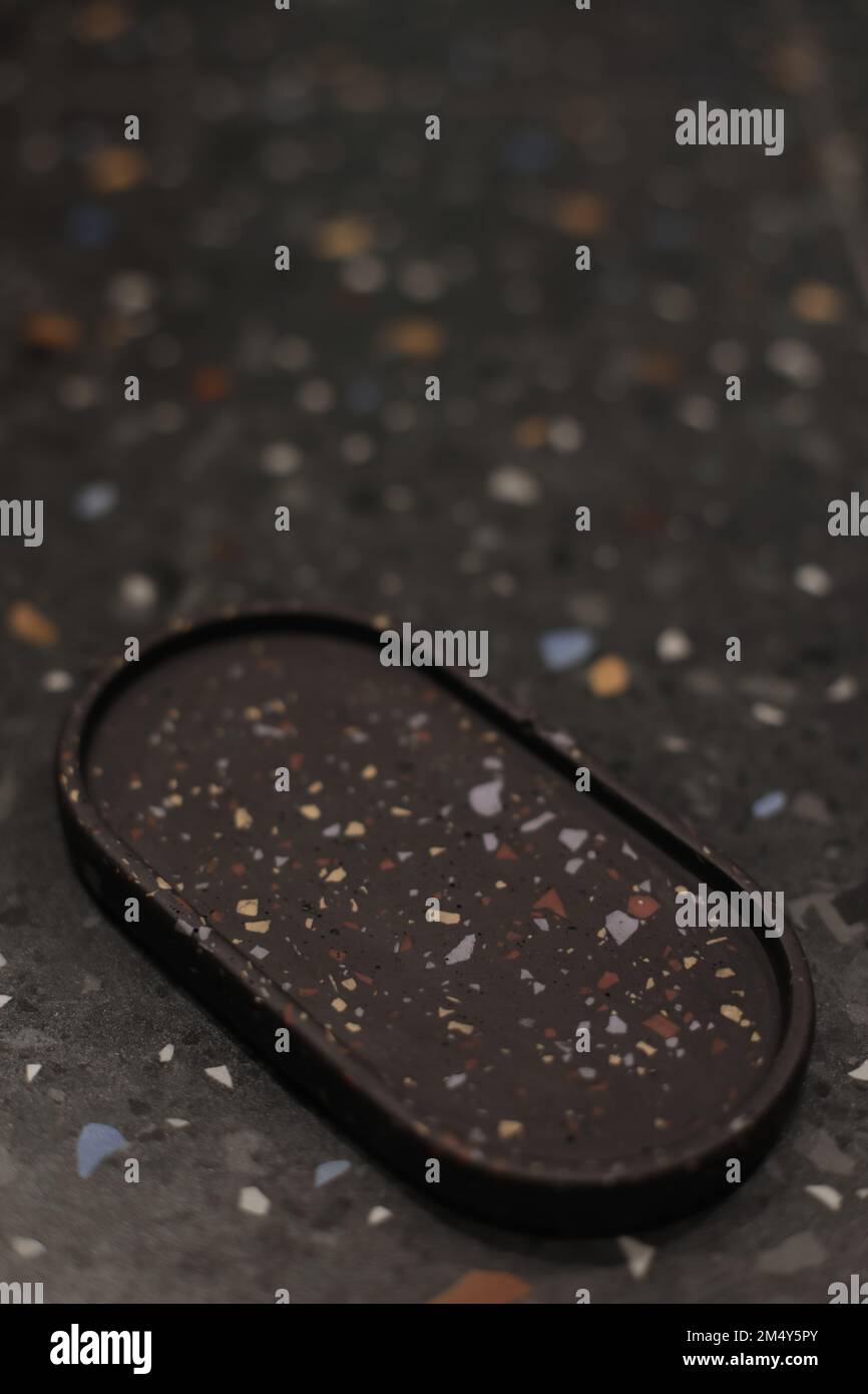 Tessuto terrazzo nero. Sfondo e sfondo. Struttura in marmo di pietra. Piastrelle da parete in ceramica Foto Stock