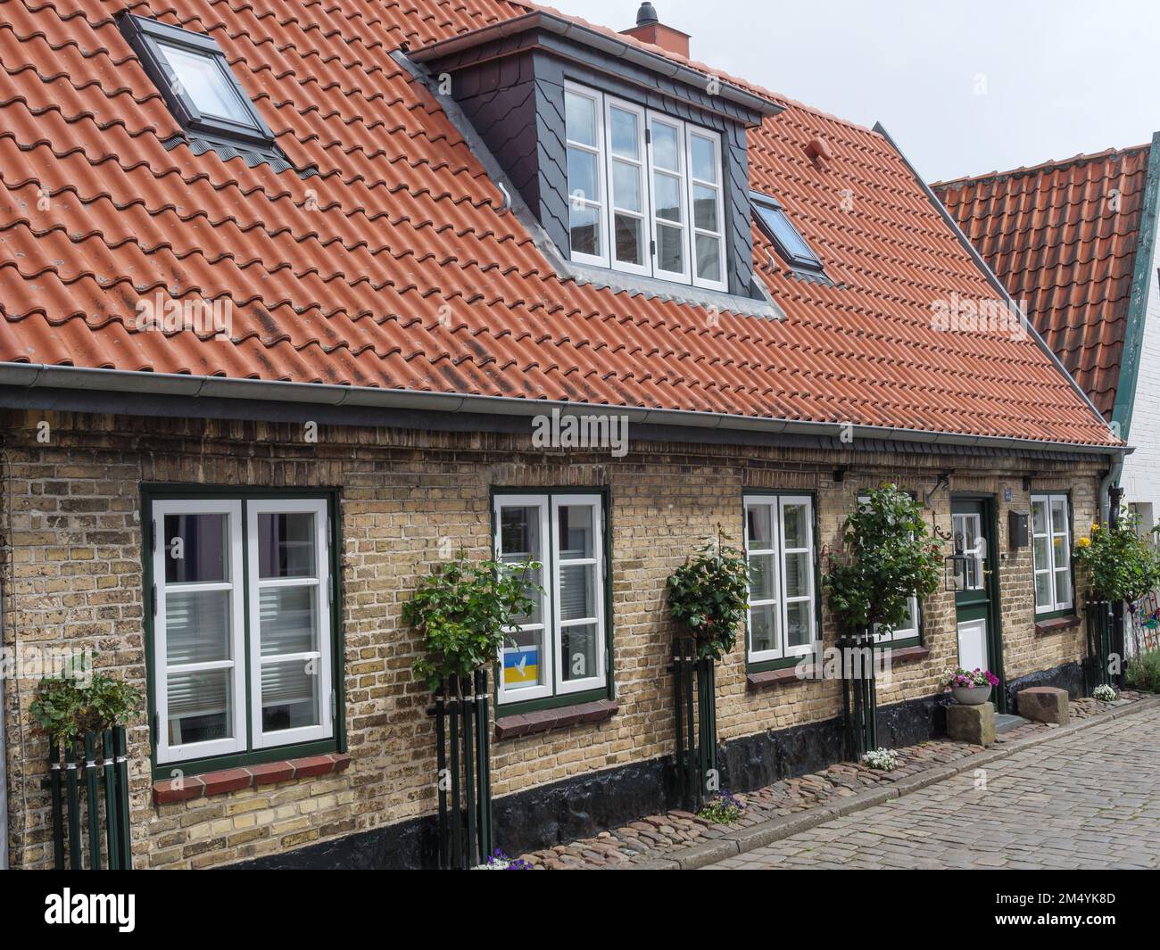L'esterno di una casa in pietra d'epoca in Schleswig-Holstein, Germania Foto Stock