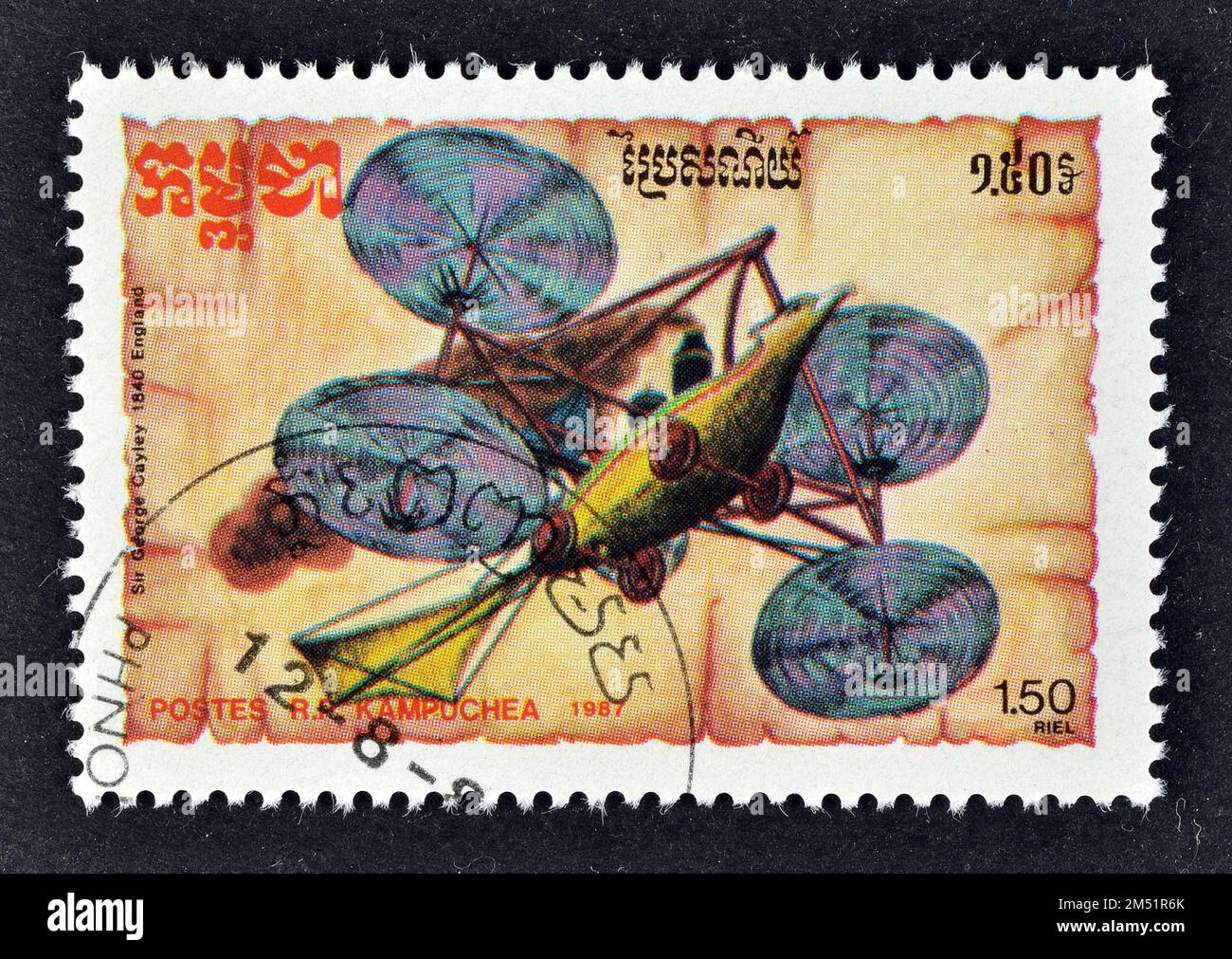 Francobollo annullato stampato dalla Cambogia, che mostra il 'convertiplano' di Sir George Cayley, 1843, circa 1987. Foto Stock