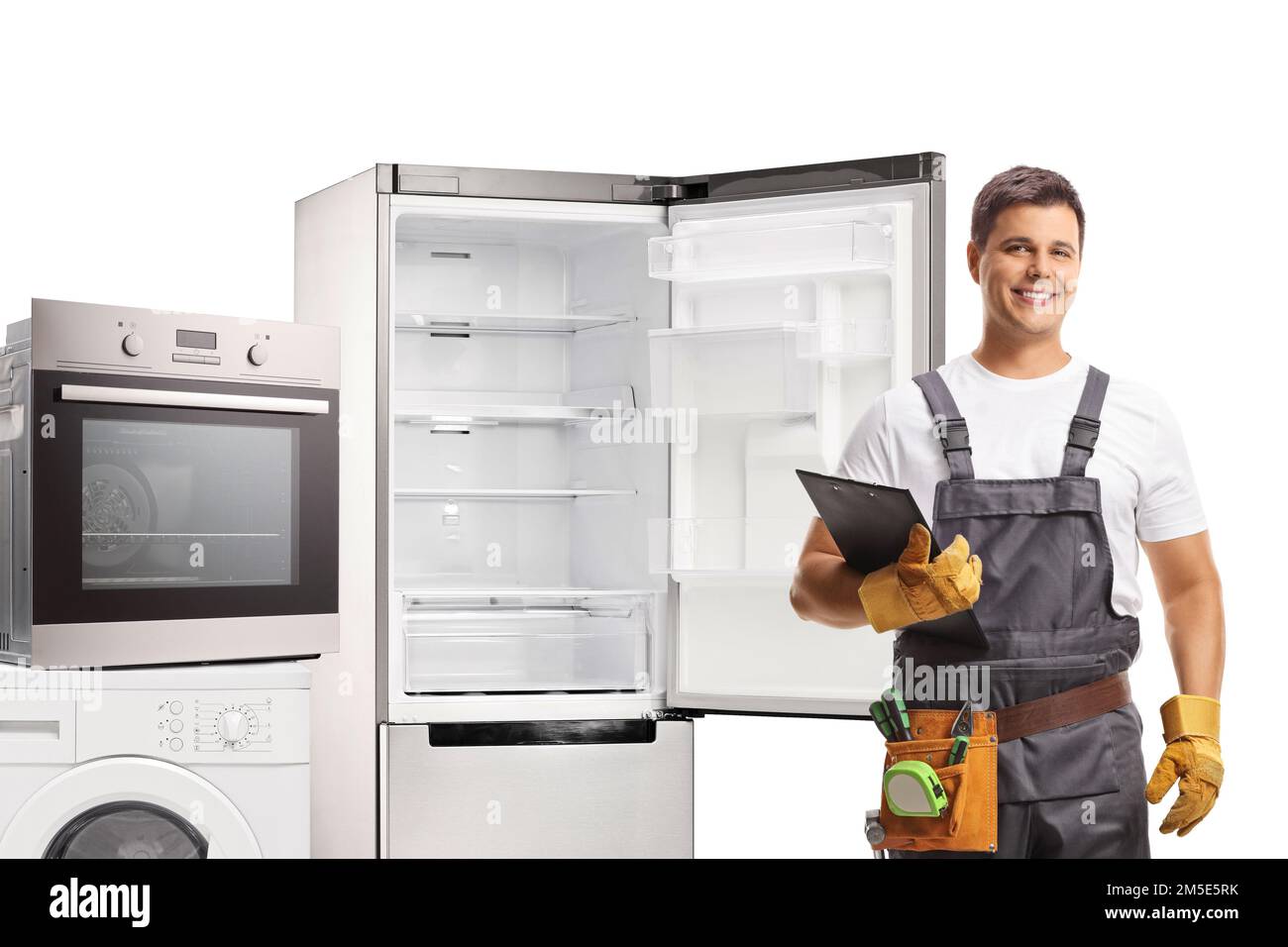Riparatore con apparecchi elettrici isolati su sfondo bianco Foto Stock