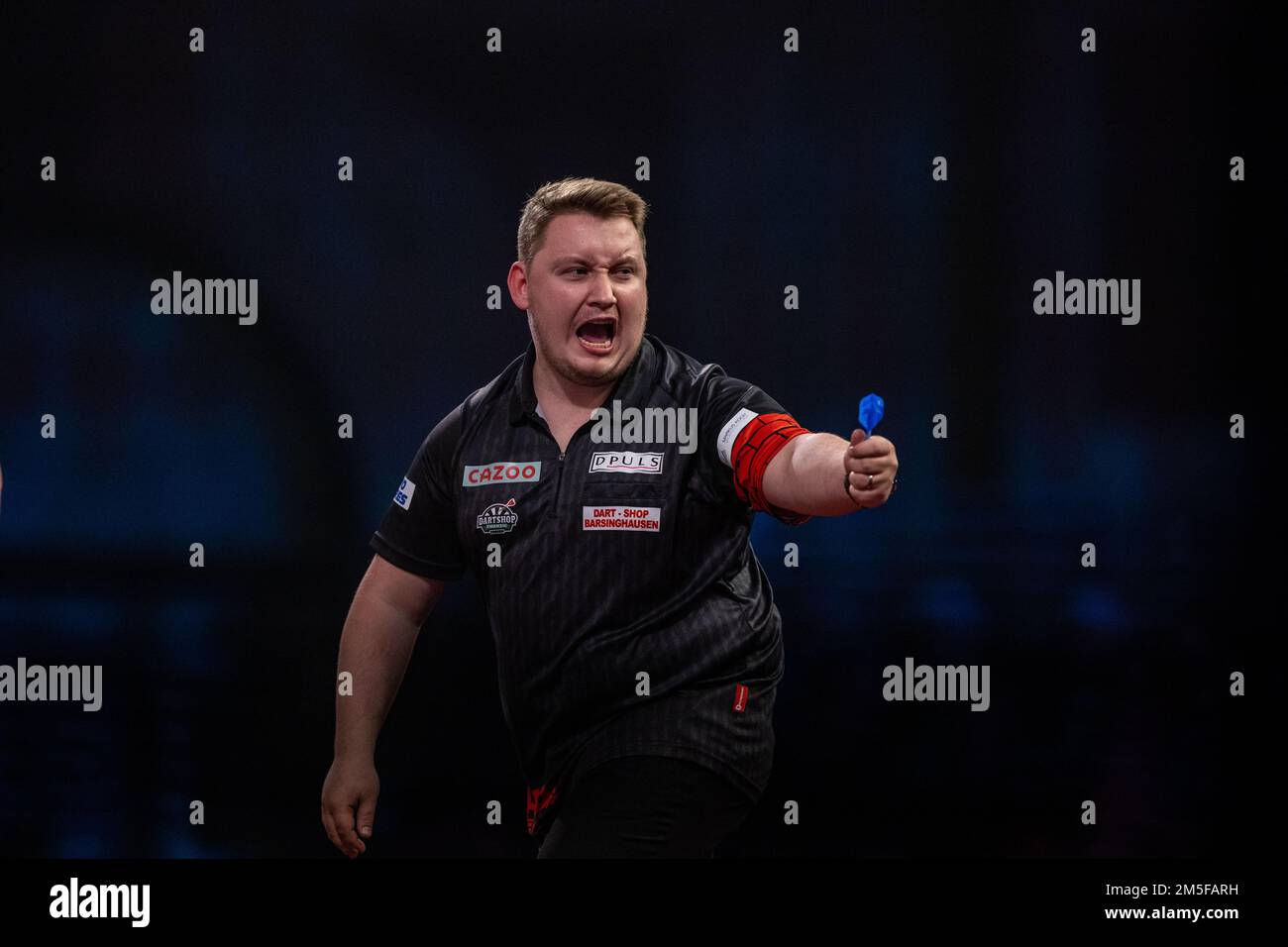 Martin Schindler reagisce durante l'undici° giorno del Cazoo World Darts Championship all'Alexandra Palace, Londra. Data immagine: Mercoledì 28 dicembre 2022. Foto Stock