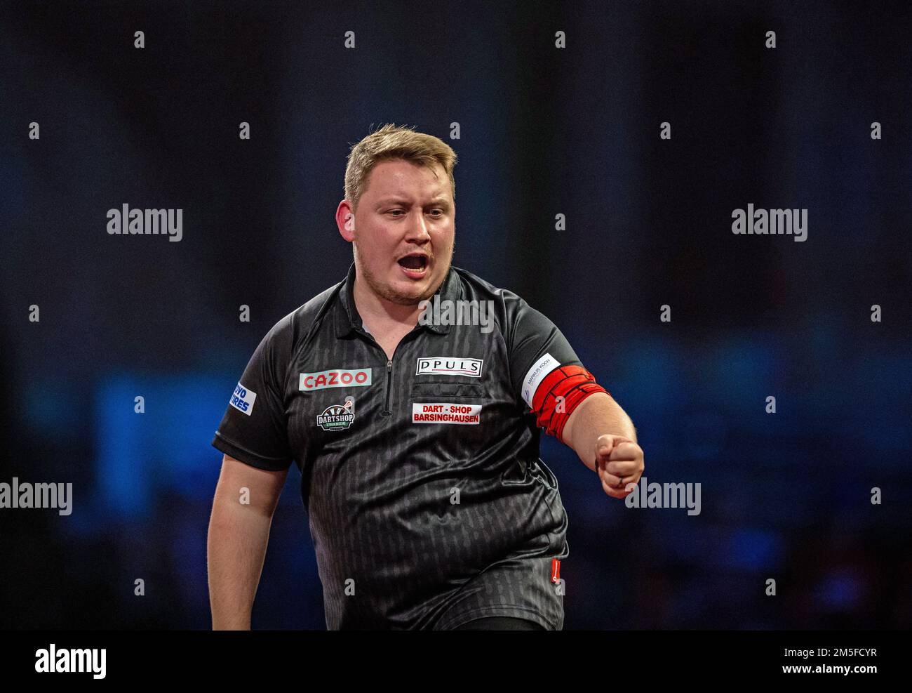 Martin Schindler reagisce durante l'undici° giorno del Cazoo World Darts Championship all'Alexandra Palace, Londra. Data immagine: Mercoledì 28 dicembre 2022. Foto Stock