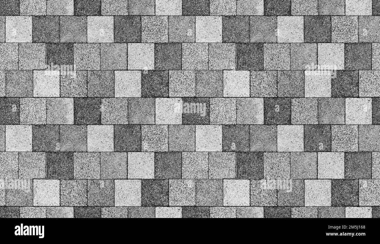 Lastre di pavimentazione grigie, pavimentazione in corsia pedonale, vista dall'alto. Texture di foto di sfondo senza cuciture Foto Stock