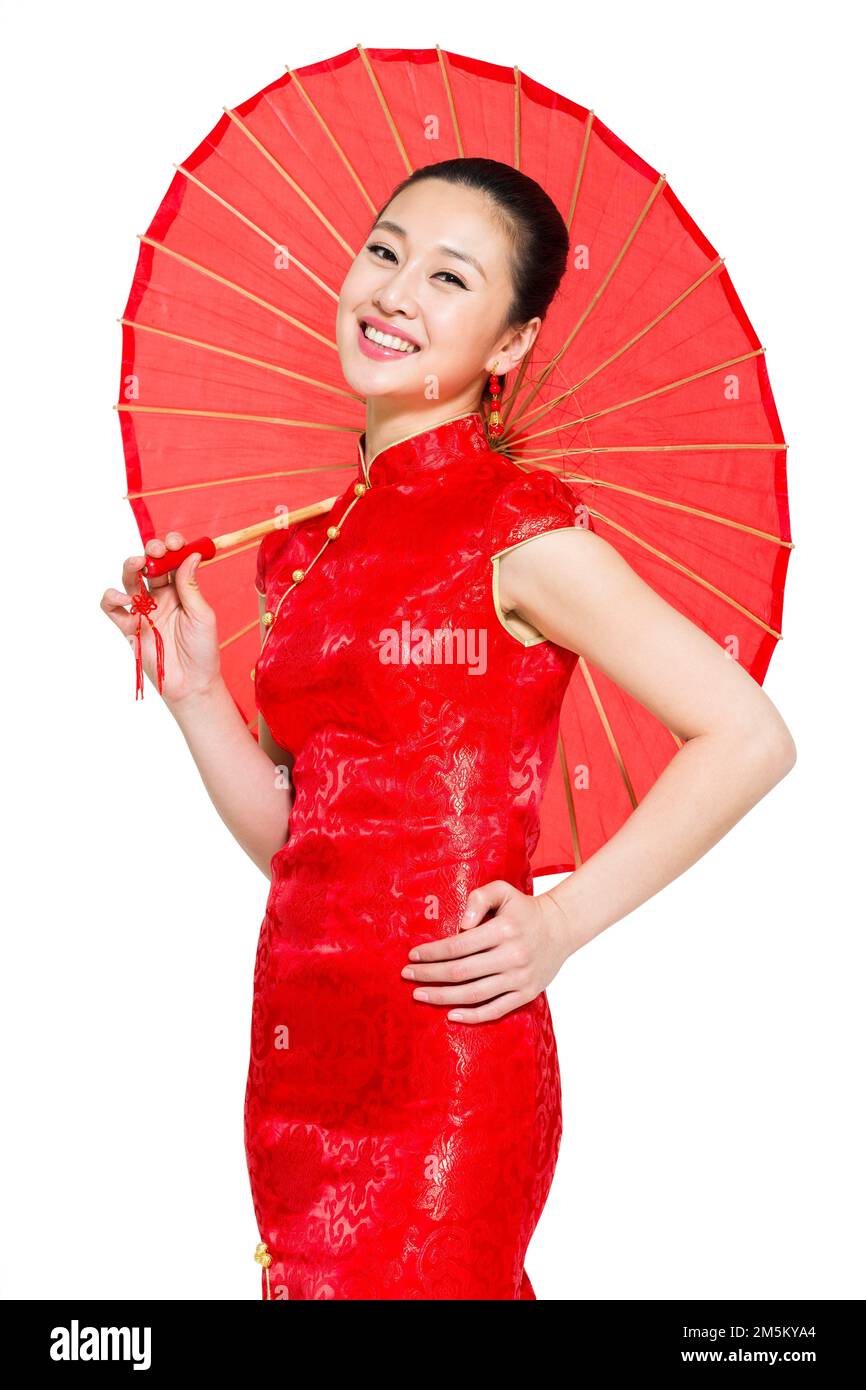 Tenda per indossare la giovane donna di gongsam rosso che trasporta l'ombrello del panno dell'olio Foto Stock