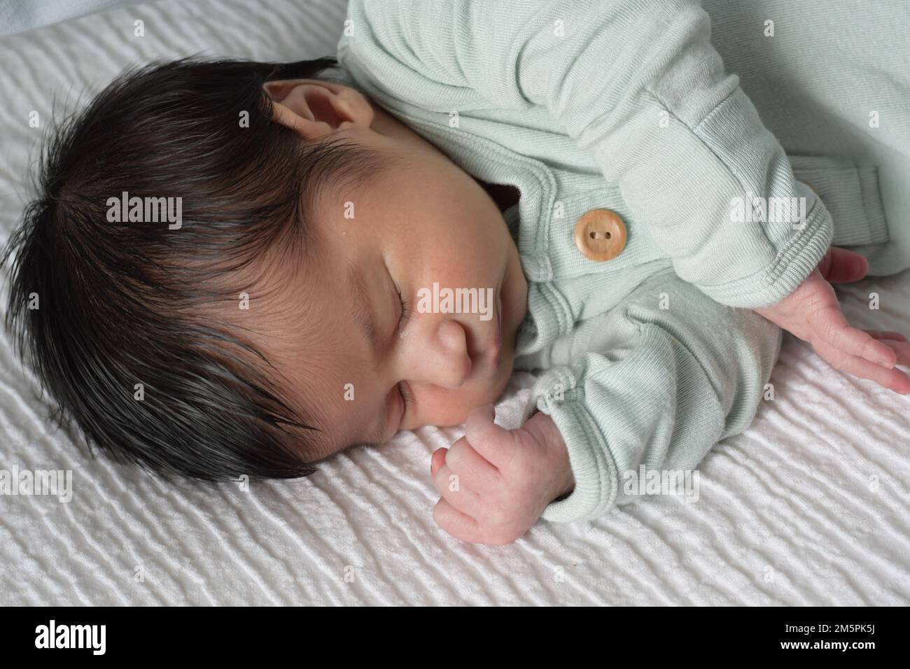 A pelo neonato Foto Stock