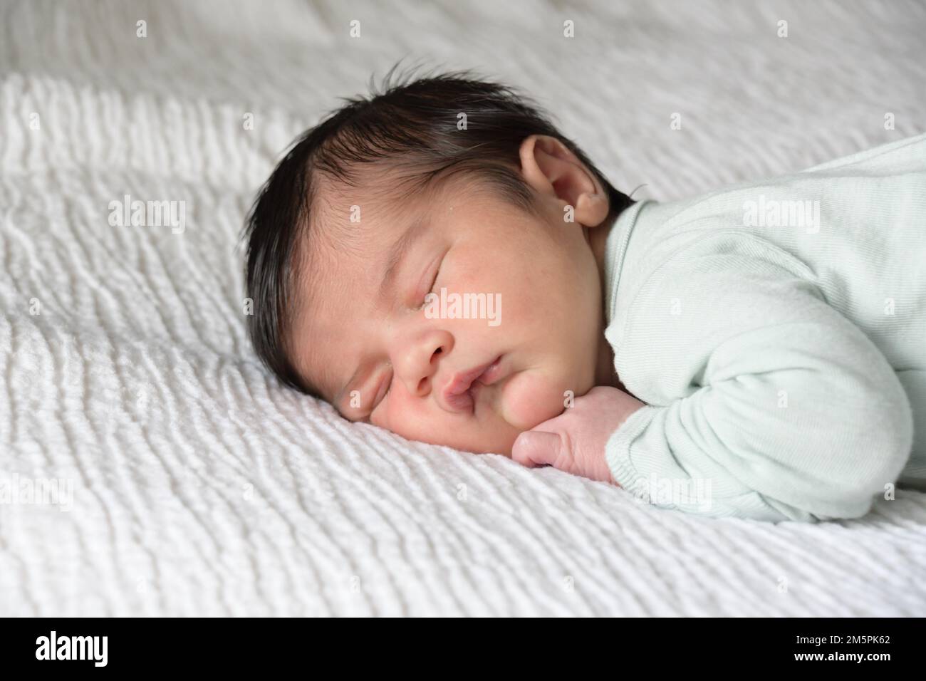 A pelo neonato Foto Stock