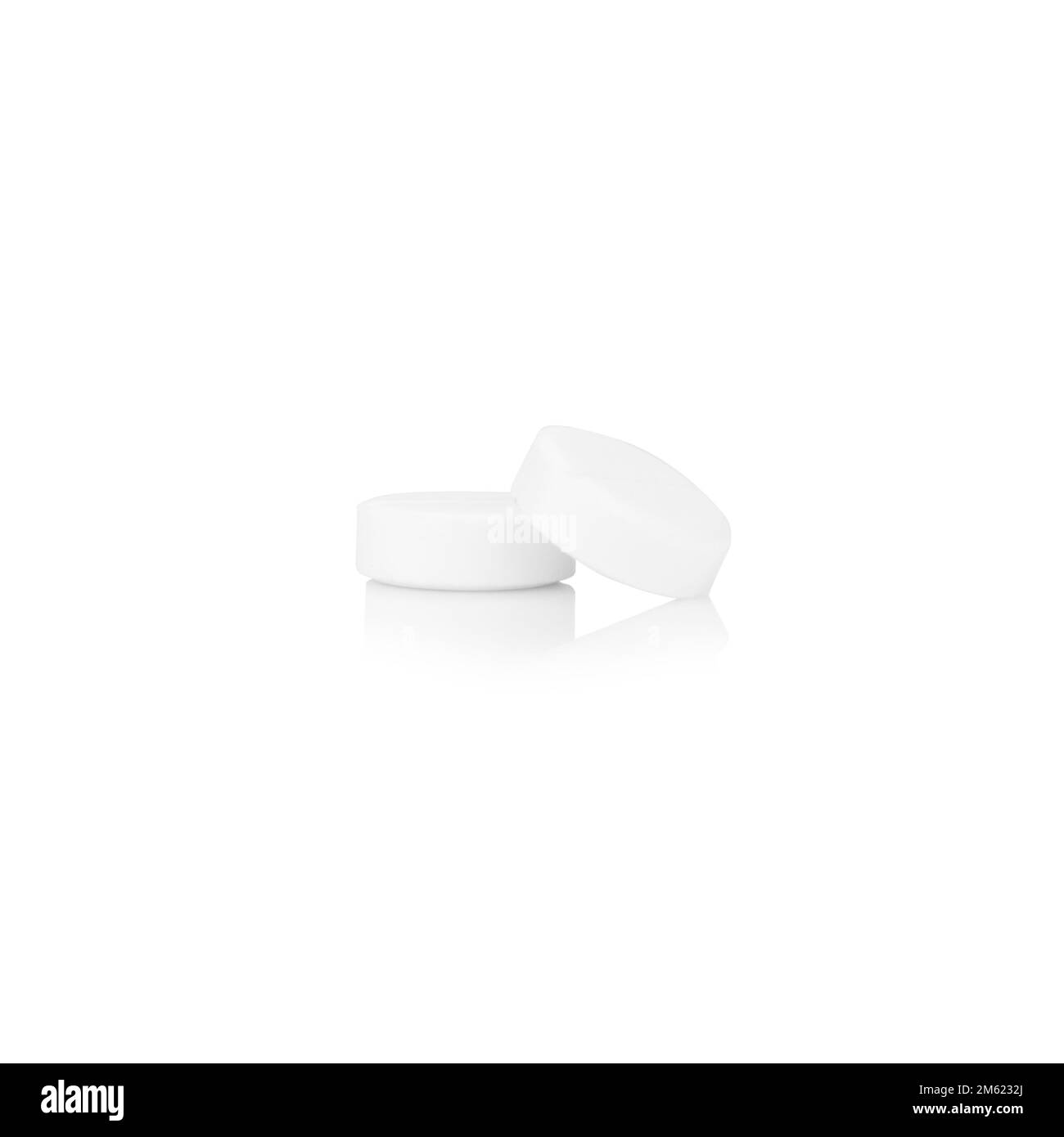 pillola bianca isolata su sfondo bianco. Foto Stock