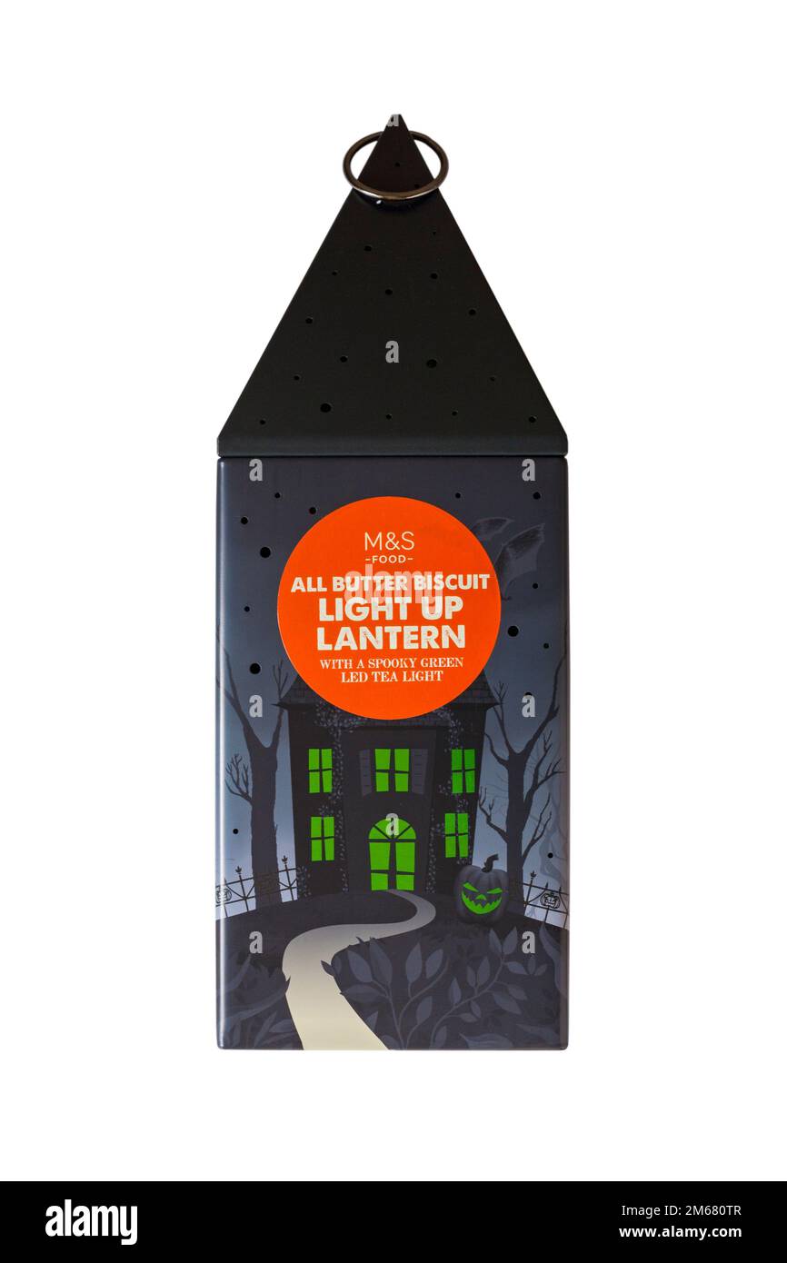Latta di Halloween isolata su sfondo bianco - tutta la lanterna del burro si accende con una spaventosa luce LED verde di M&S. Foto Stock