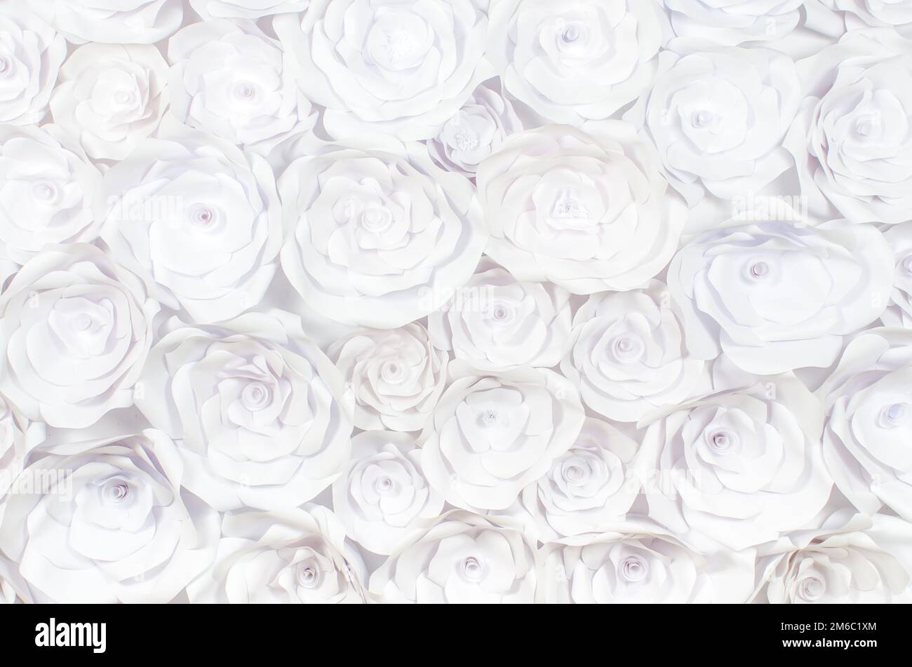 Parete con uno sfondo di fiori di carta artigianato artigianale astrazione creativa Foto Stock