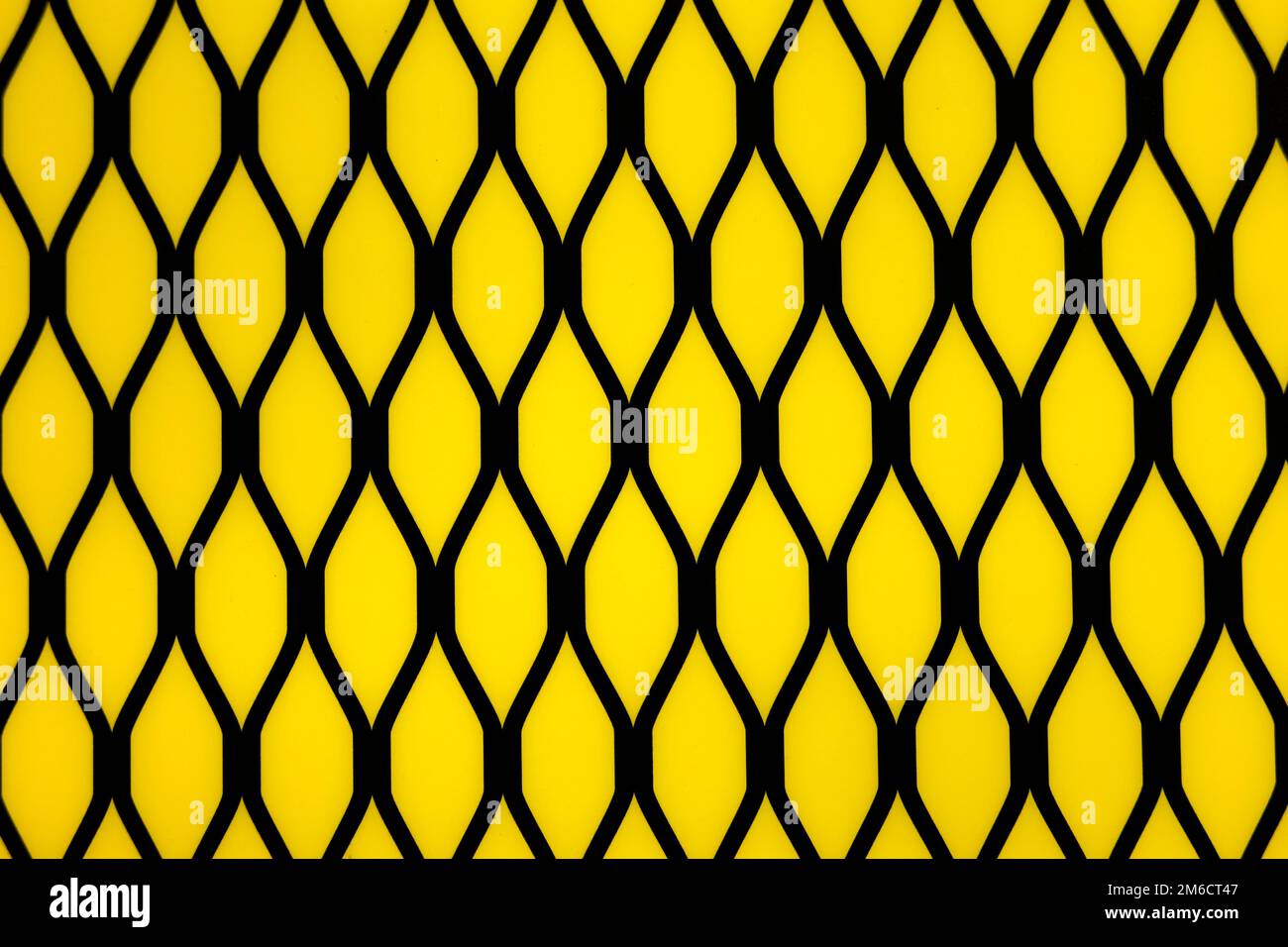 Pannello perforato con design geometrico in metallo decorativo Foto Stock