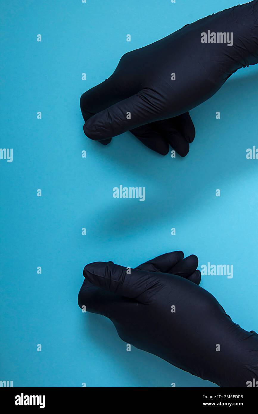 Guanti in nitrile nero Foto Stock