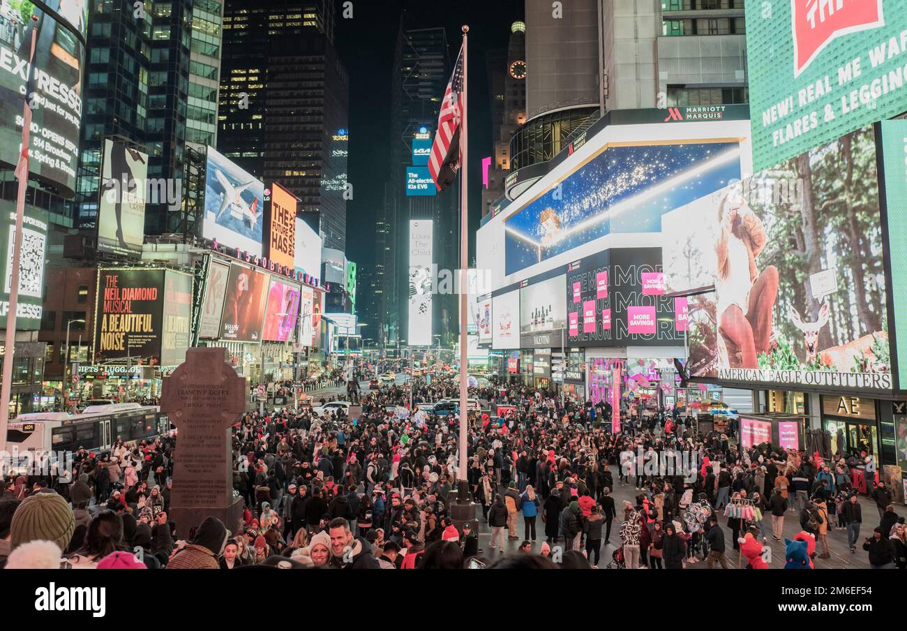Visitatori a Times Square, New York City Foto Stock