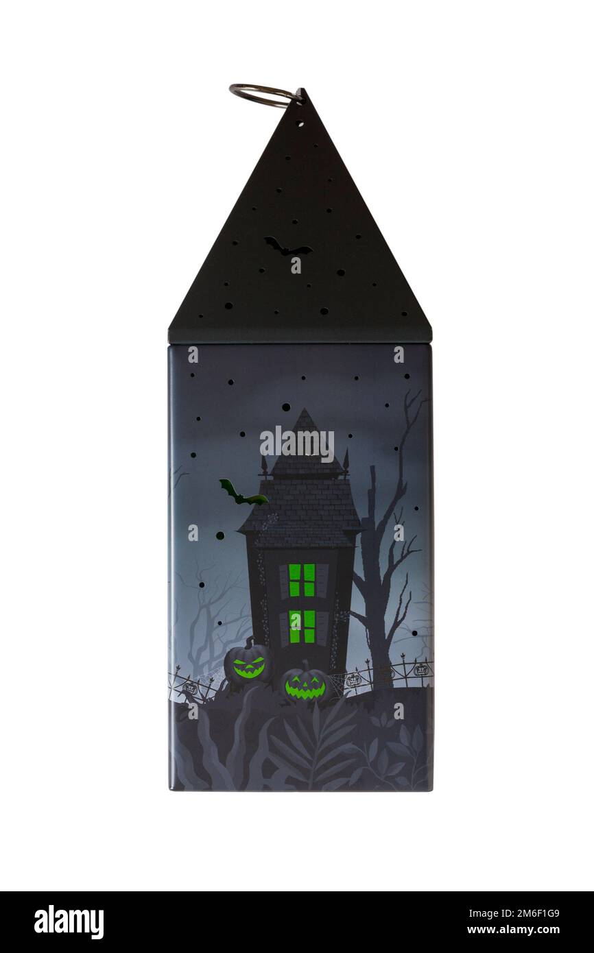 Latta di Halloween isolata su sfondo bianco - tutta la lanterna del burro si accende con una spaventosa luce LED verde di M&S. Foto Stock