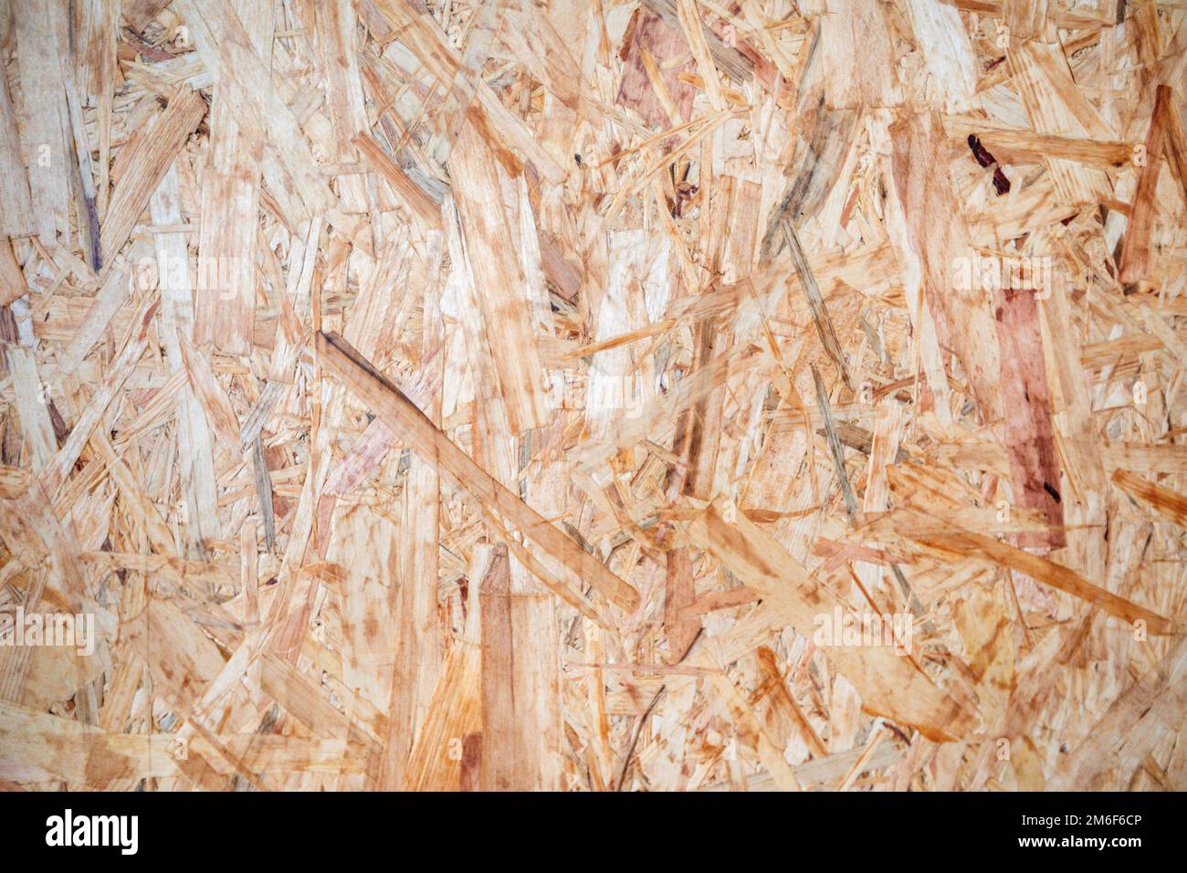 La lastra di OSB è fatta di trucioli di legno marrone Foto Stock