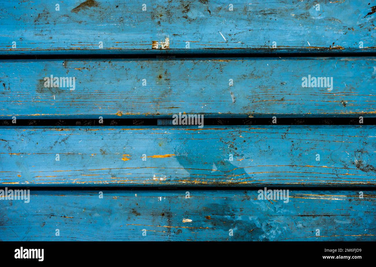 Tavole di legno blu in un molo Foto Stock