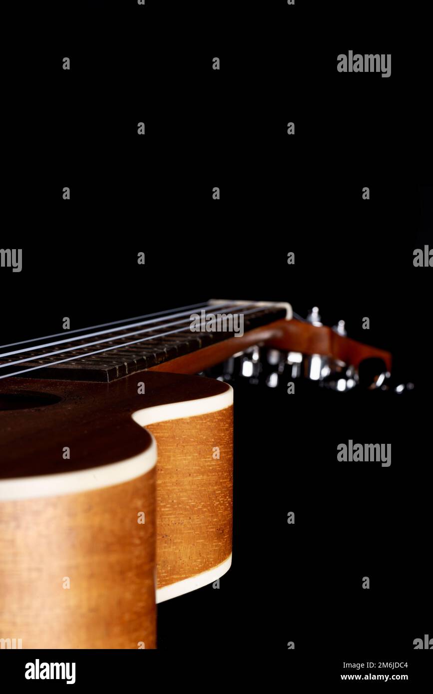 Primo piano della vista prospettica di ukulele per chitarra Foto Stock