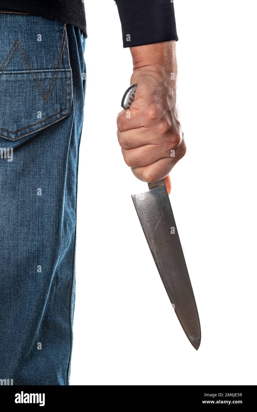 La persona indossa jeans blu pelle pelosa chef tenendo coltello da cucina a mano Foto Stock