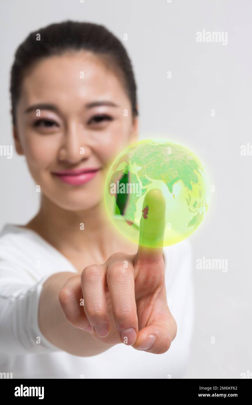 I ricercatori high-tech utilizzano il touch screen Foto Stock