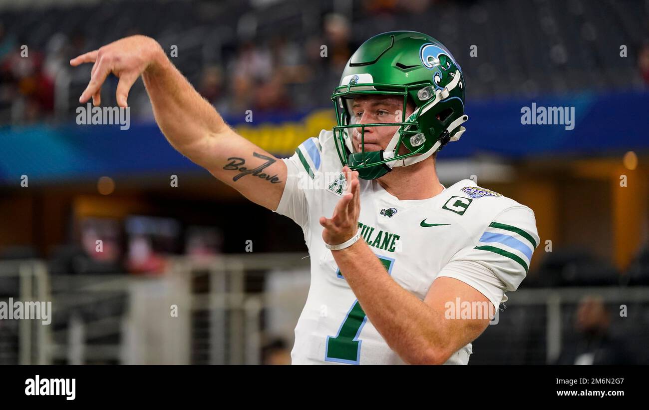 Tulane quarterback Michael Pratt (7) warms up before the Cotton Bowl NCAA college football game