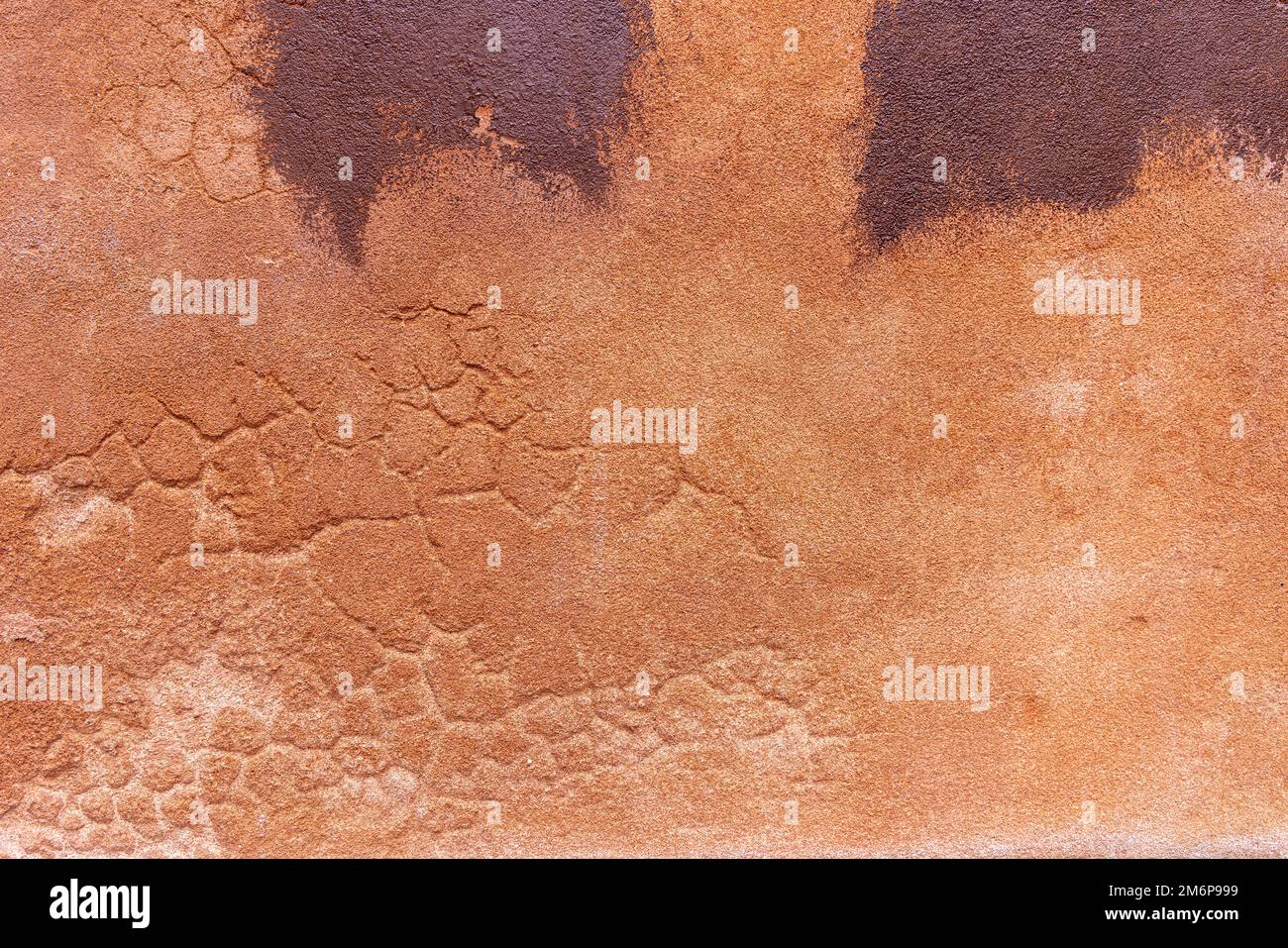 Immagine astratta della parete arancione grunge sfondo texture per la decorazione d'interni. Foto Stock