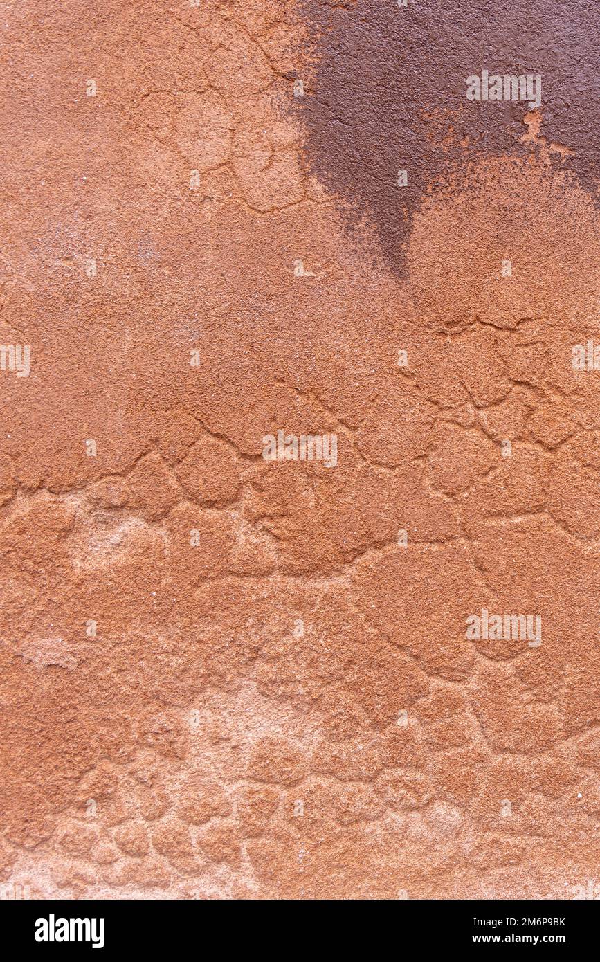 Immagine astratta della parete arancione grunge sfondo texture per la decorazione d'interni. Foto Stock