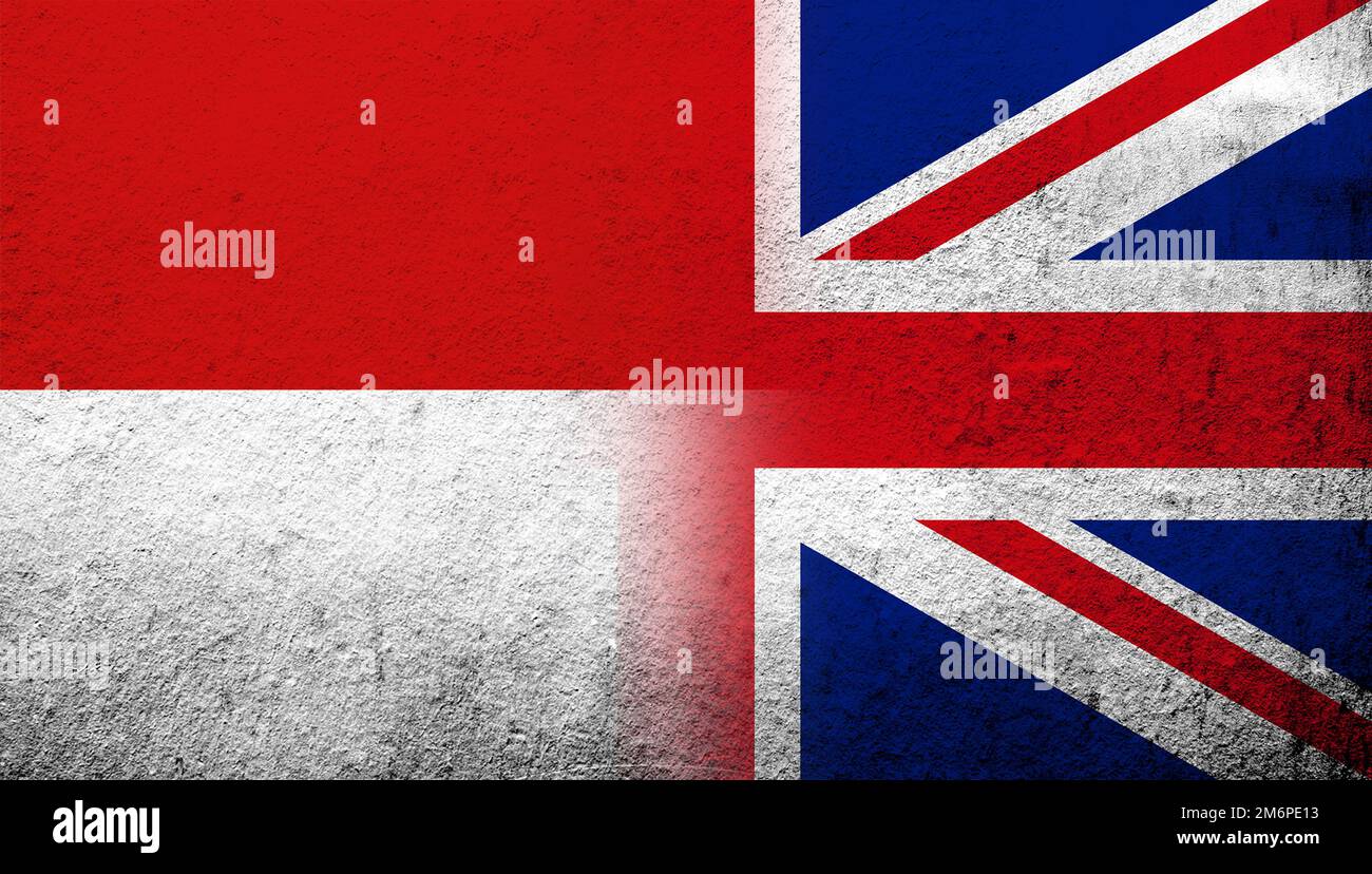 Bandiera nazionale del Regno Unito (Gran Bretagna) Unione Jack con la Repubblica di Indonesia bandiera nazionale. Sfondo grunge Foto Stock