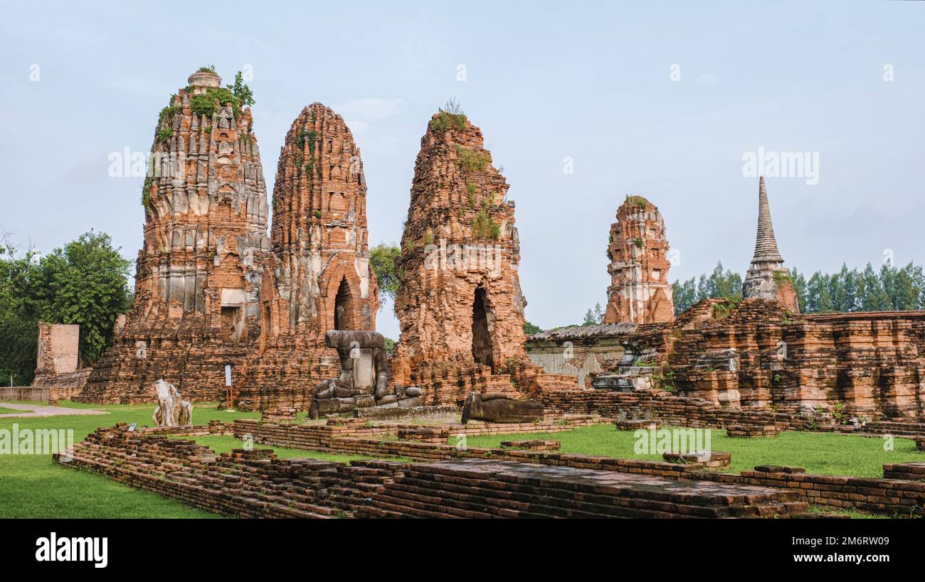 Ayutthaya, Thailandia a Wat Mahathat, stupa tempio nel mattingvisiting Ayyuthaya Thailandia Foto Stock