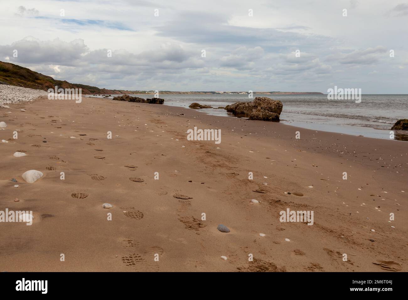 L'ampia spiaggia che corre fino a Filey, North Yorkshire Foto Stock