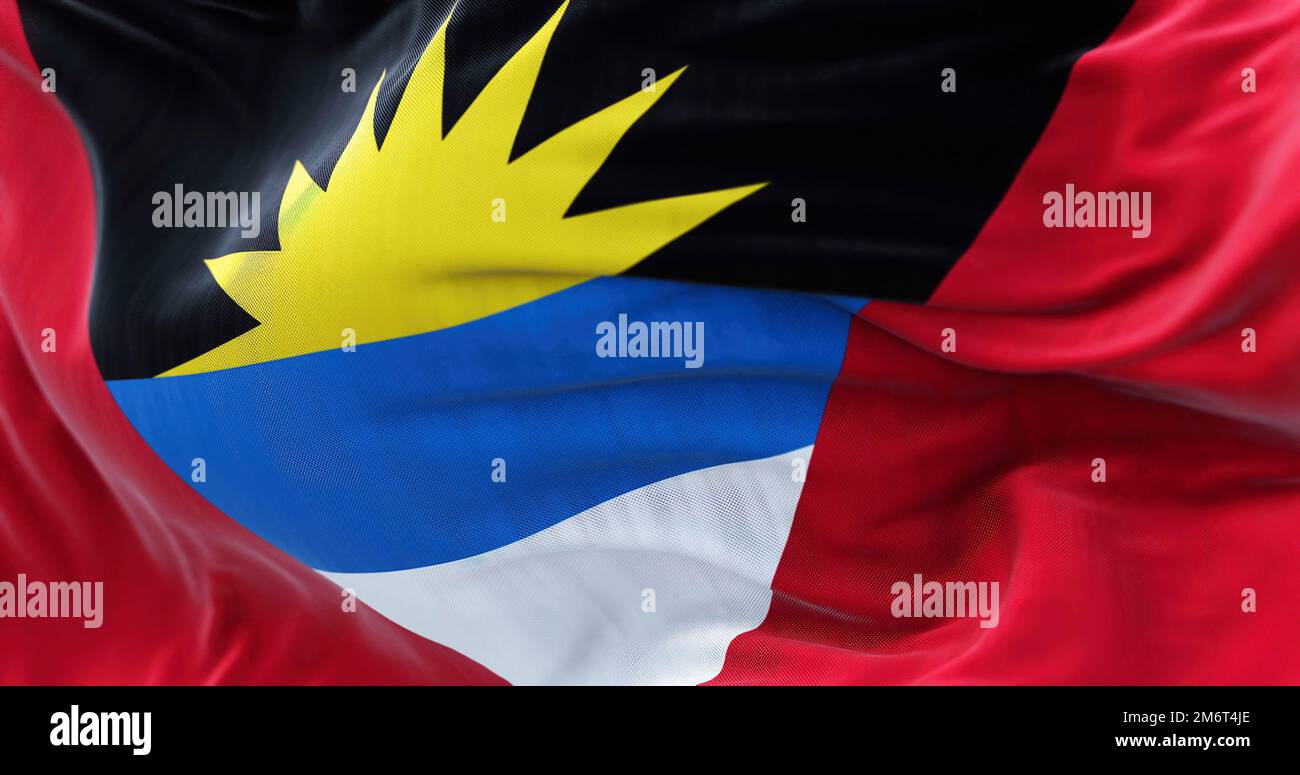 Vista ravvicinata della bandiera nazionale di Antigua e Barbuda che sventola nel vento Foto Stock