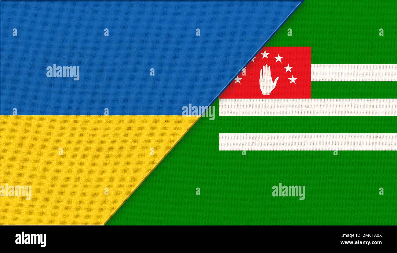Le bandiere dell'Ucraina e dell'Abkhazia in figura. Trama del tessuto Foto Stock