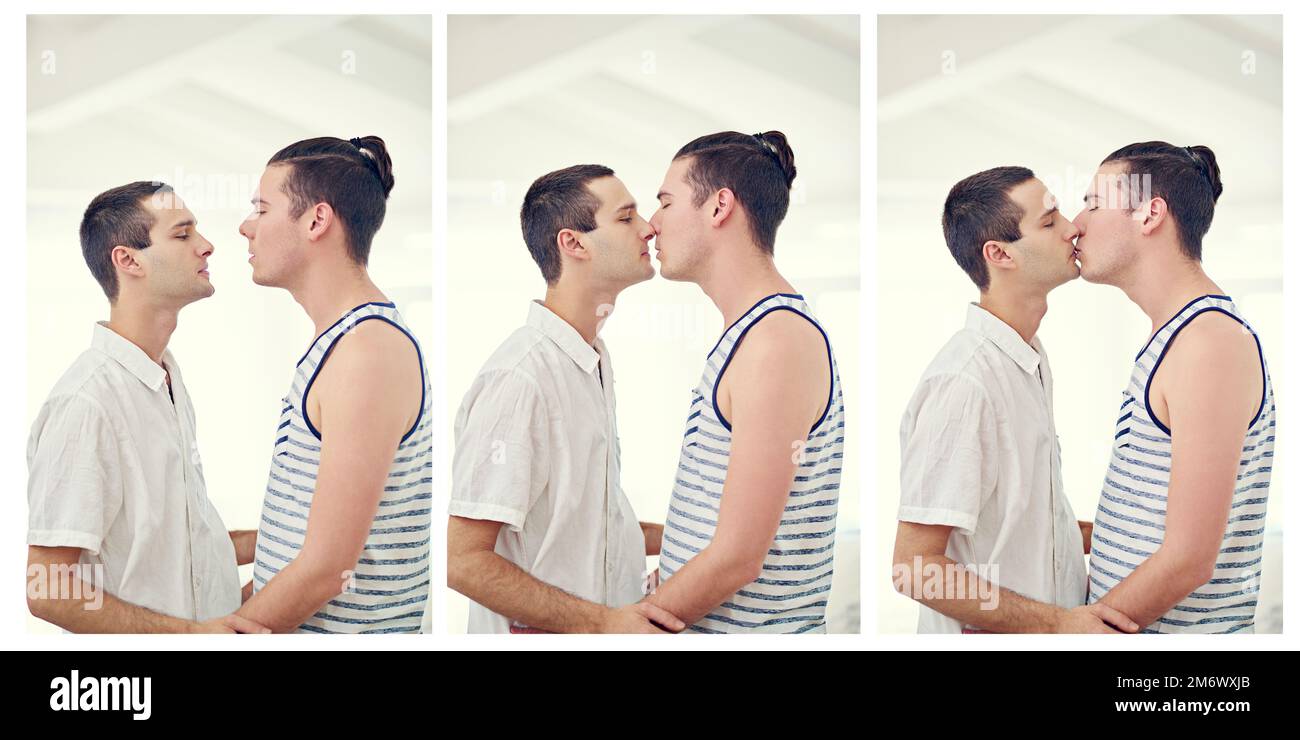 Il bacio del vero amore. una giovane coppia gay che si gode la loro giornata insieme. Foto Stock