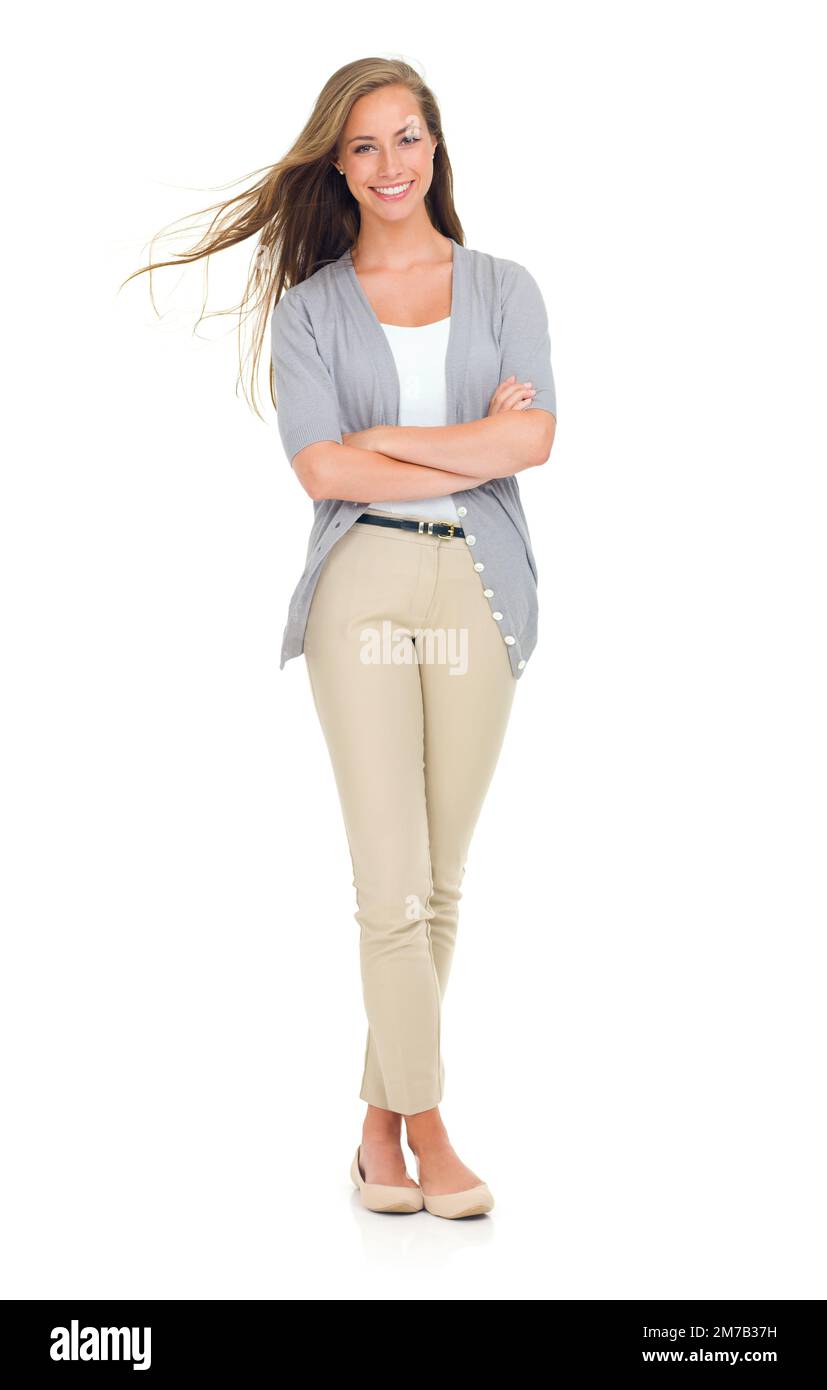 Bello ed elegante. Ritratto completo di una bella giovane donna isolata su bianco. Foto Stock