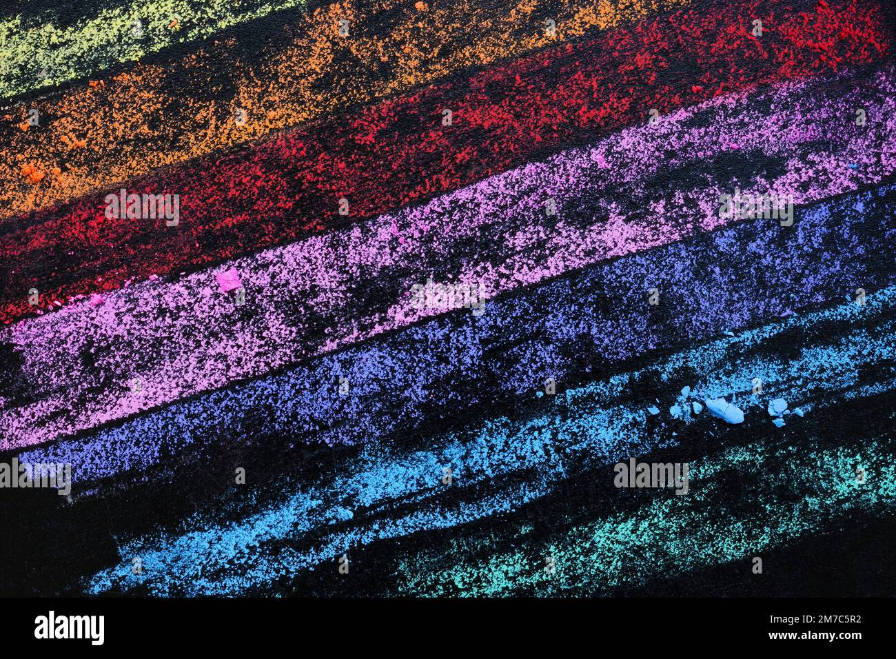 Sfondo multicolore con linee di pastelli colorati. Foto Stock