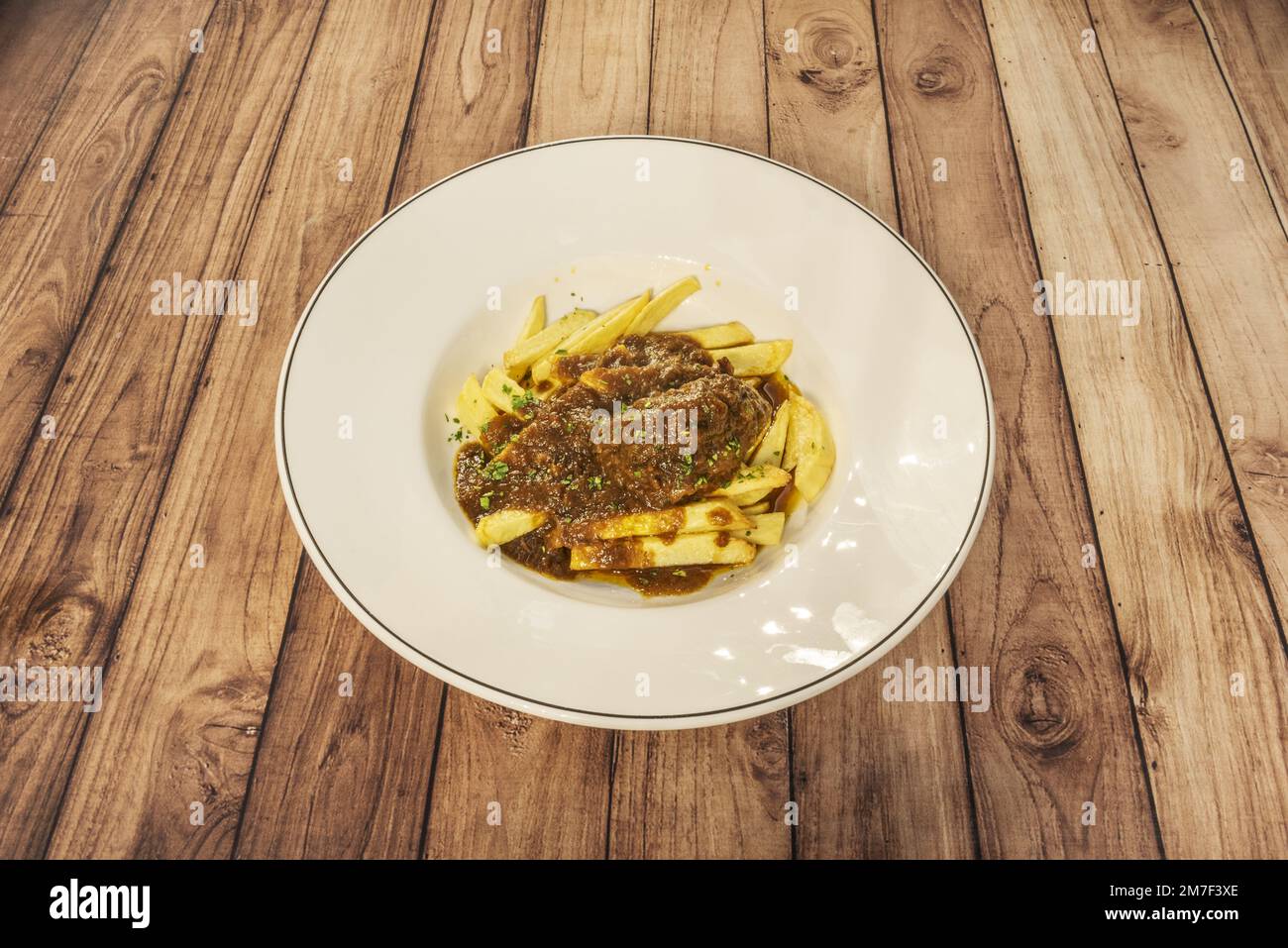 La guancia è un taglio di carne di maiale e vitello proveniente dai muscoli masseteri. Corrisponde alle parti grasse che si trovano su entrambi i lati della faccia e appartengono Foto Stock