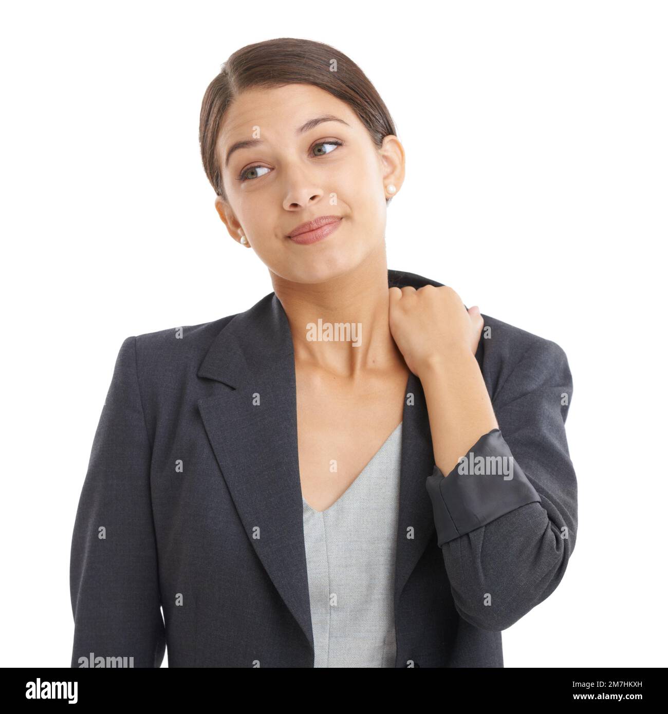 Prendiamo un salto di fede. Studio shot di una giovane attraente donna d'affari che guarda incerta. Foto Stock