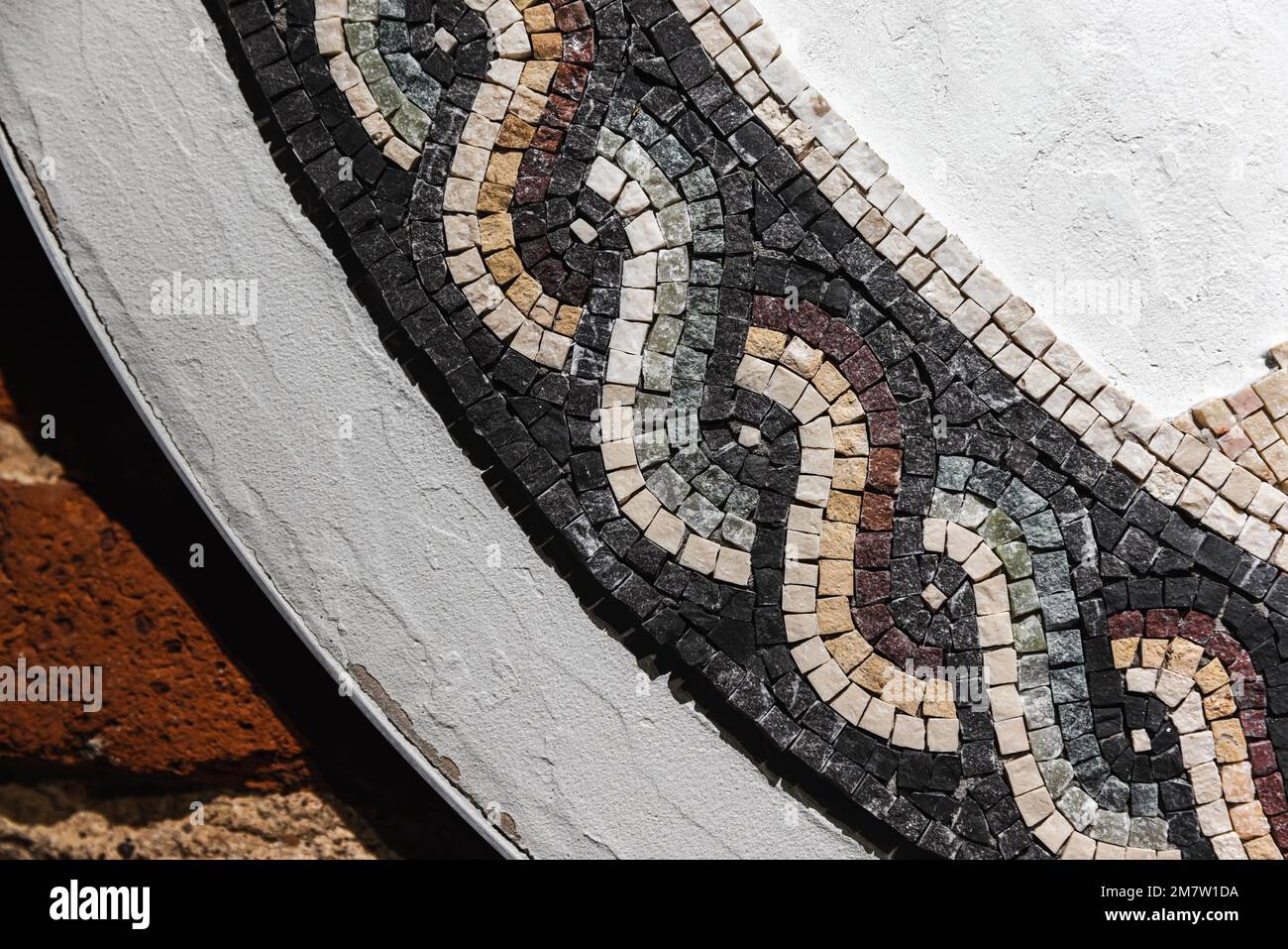 Motivo mosaico in pietra vintage, texture foto di sfondo in primo piano Foto Stock