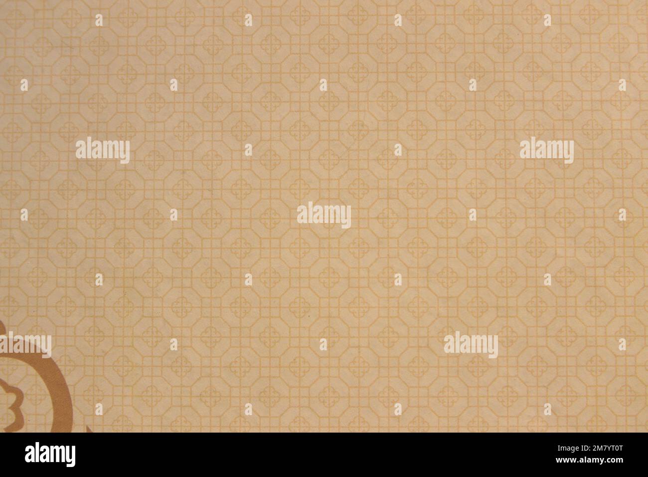 Immagine di una superficie con decorazione geometrica in tonalità marrone con spazio copia e una piccola decorazione in un angolo Foto Stock Immagine di una superficie con decorazione geometrica in tonalità marrone con spazio copia e una piccola decorazione in un angolo Foto Stock