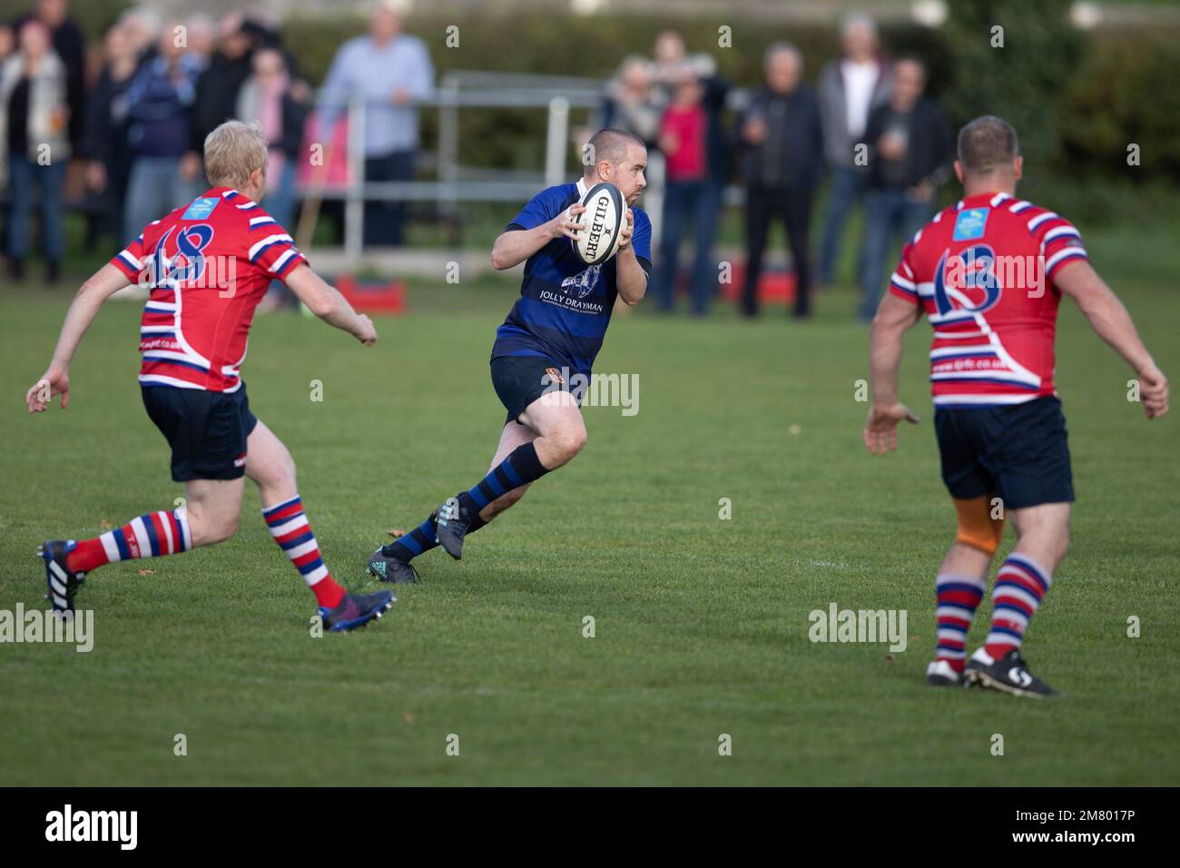 Giocatore di rugby di azione di gioco di squadra di Rugby Foto Stock