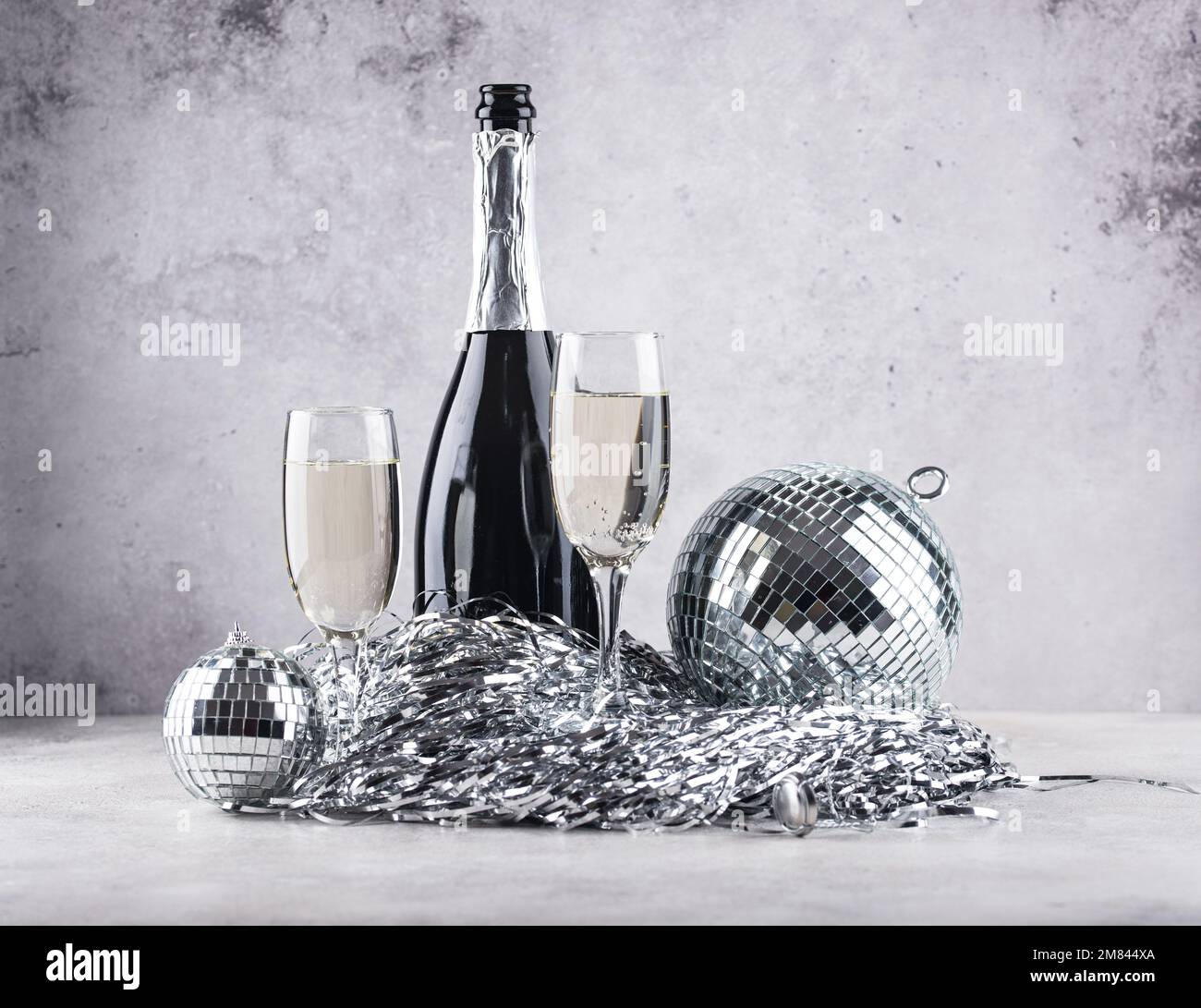 Bicchiere di champagne con discoteca. Foto Stock
