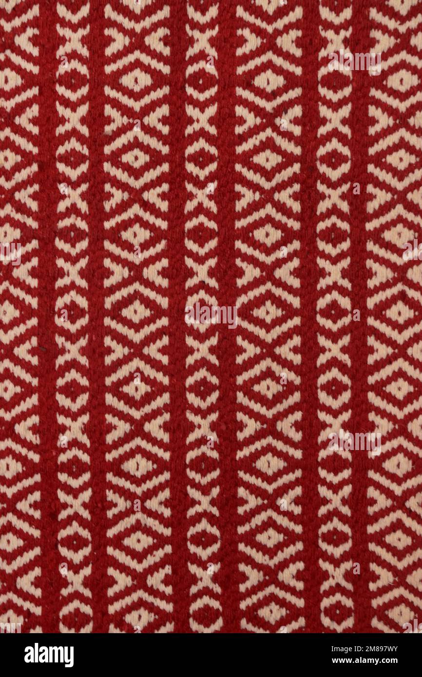 motivo geometrico di un tessuto bianco e rosso Foto Stock