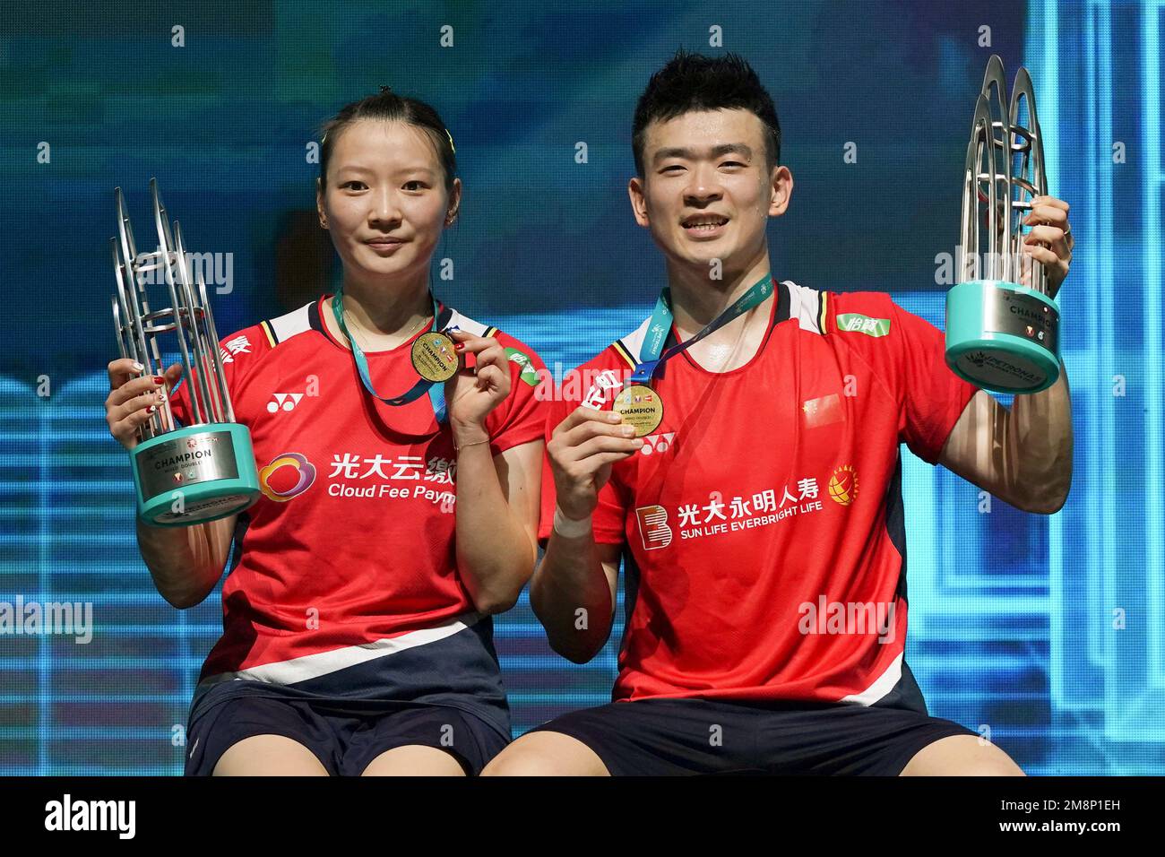 China’s Huang Ya Qiong, left, and Zheng Si Wei celebrate with their