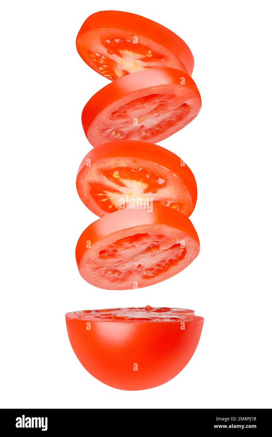 Pomodori volanti tagliati in cerchi. Pomodori, pomodori, tagliati, pomodori freschi. Isolato. verticalmente. Parte del pomodoro dal basso. Foto Stock