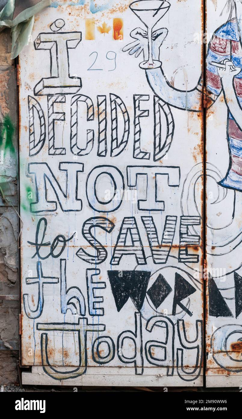 Ho deciso di non salvare il mondo oggi Graffiti fotografato a Florentin, Tel Aviv, Israele Foto Stock