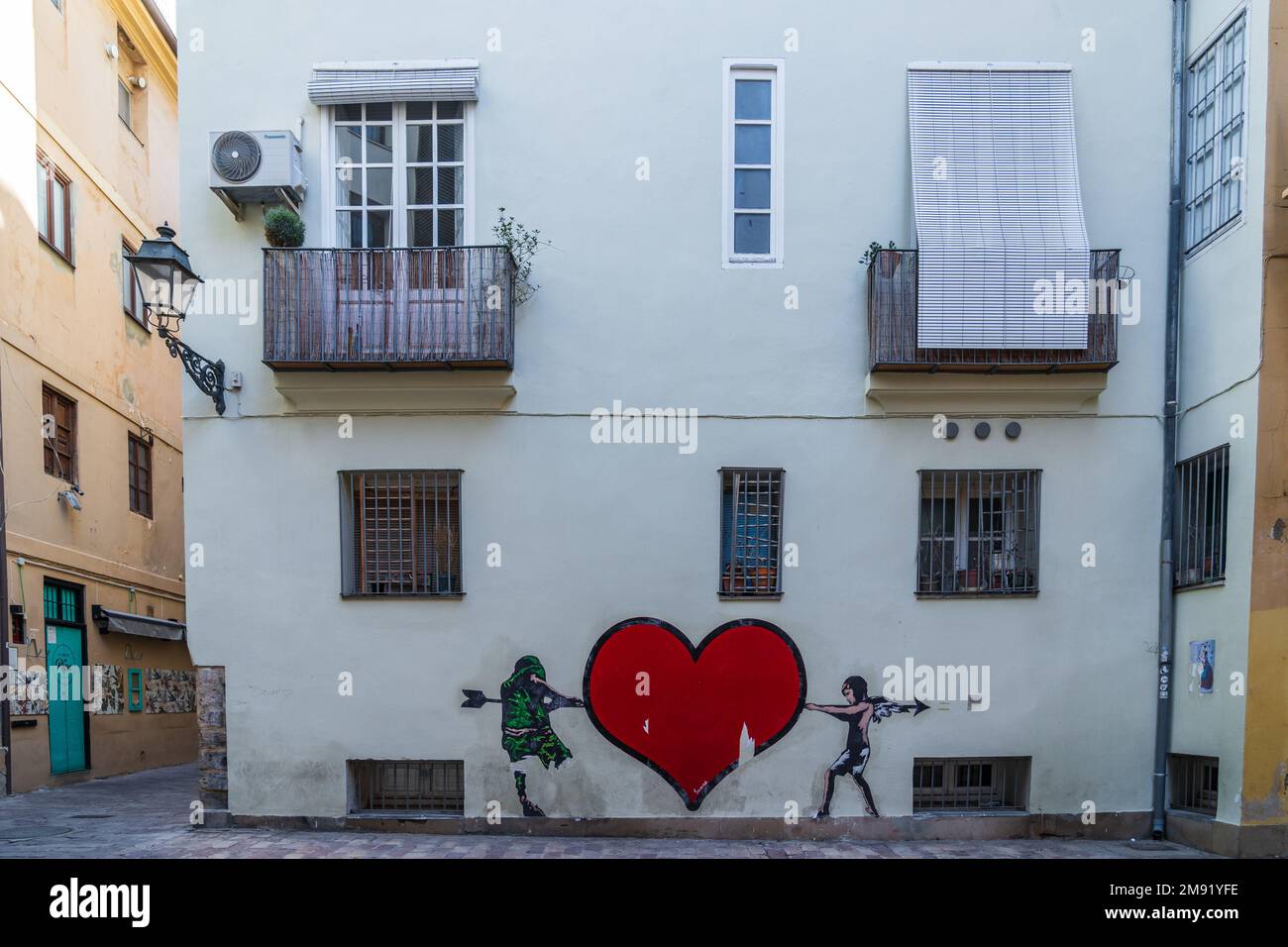 Graffiti sulle mura del quartiere storico di Valencia. Spagna. Foto Stock