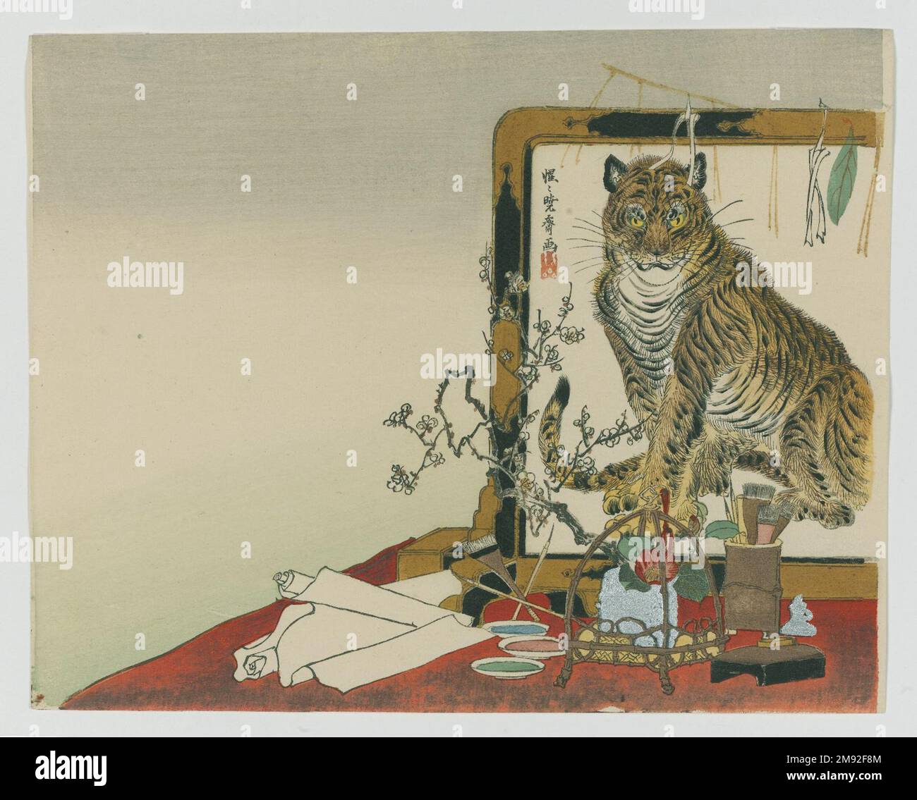 Schermo in piedi (Tsuitate) di una Tiger Kawanabe Kyosai (giapponese, 1831-1889). , 1878. Stampa a blocchi di legno a colori su carta, 9 x 11 5/16 pollici (22,9 x 28,7 cm). In questa stampa, molto probabilmente progettata per celebrare l’arrivo dell’anno della Tigre nel 1878, Kyōsai raffigura uno studio d’artista con tutti gli accessori di un pittore esperto, tra cui inchiostro, pennelli e rotoli di carta. Kyōsai è stato celebrato per le sue raffigurazioni di animali, e in questa stampa mostra la sua abilità con la raffigurazione di una maestosa tigre su uno schermo dipinto, un'immagine all'interno di un'immagine. Ha abilmente reso la sua firma A. Foto Stock