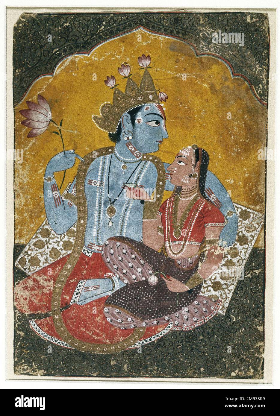 Krishna e Radha Indian. , ca. 1690-1700. Acquerello opaco con oro goffrato su carta, foglio: 10 1/8 x 7 pollici (25,7 x 17,8 cm). Krishna è un avatar (manifestazione terrena) del dio blu Vishnu. Visse la prima parte della sua vita tra i cowherds nelle campagne. Anche se questa immagine lo pone in un ambiente sontuoso, egli mantiene ancora il lungo, stretto flauto che ha giocato nei pascoli. Gli dei sono spesso adorati insieme ai loro consorti di dea. La partner femminile di Krishna è Radha, che alcune tradizioni considerano un avatar della consorte di Vishnu, Lakshmi. Arte asiatica ca. 1690-1700 Foto Stock