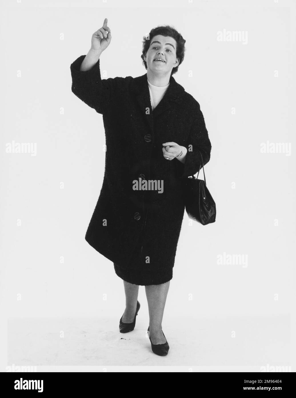 Ritratto a tutta lunghezza di una donna che ondita. Foto Stock