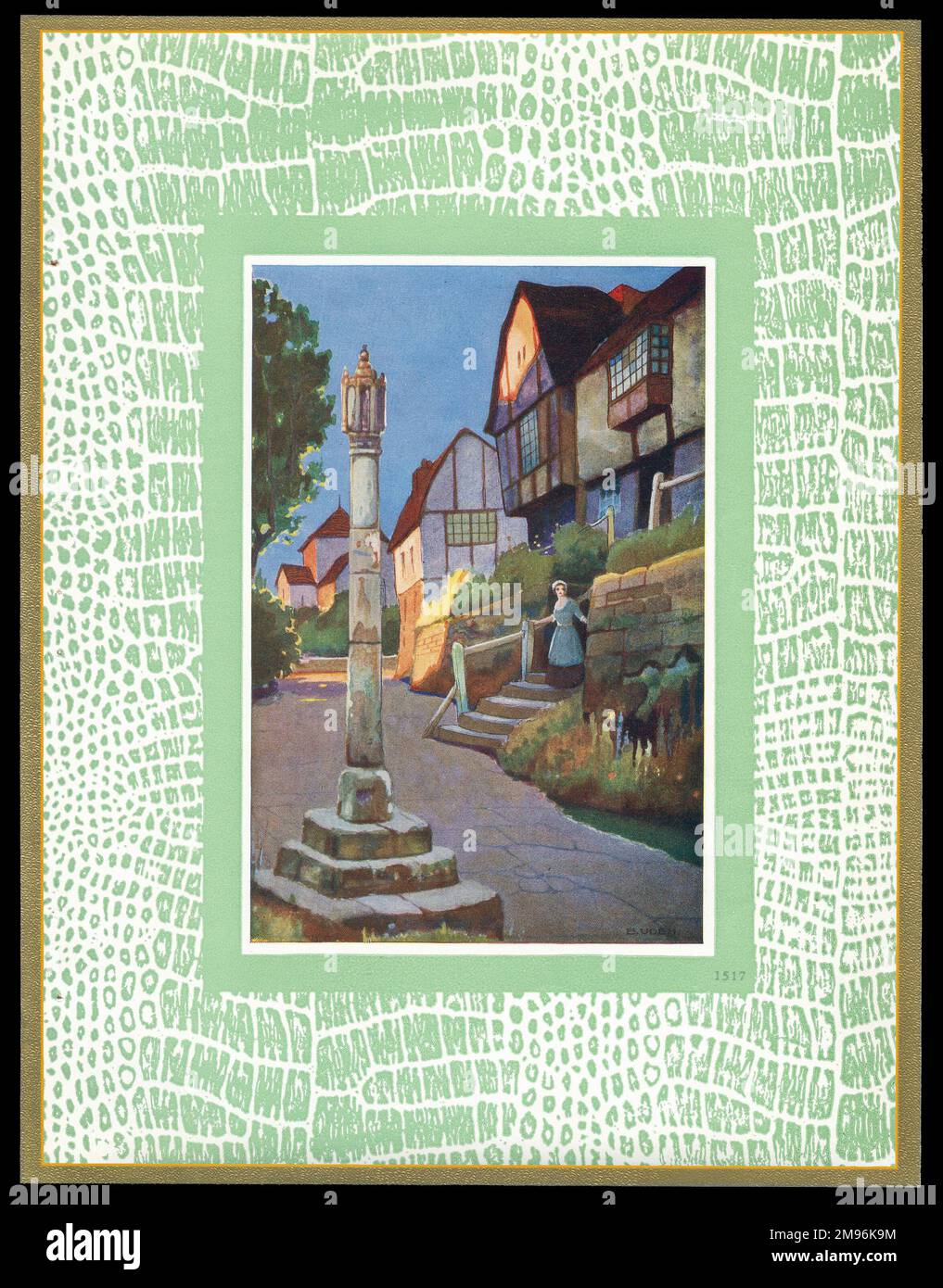 Design a scatola di cioccolato, caratterizzato da una scena di strada del villaggio con un monumento in primo piano. Foto Stock