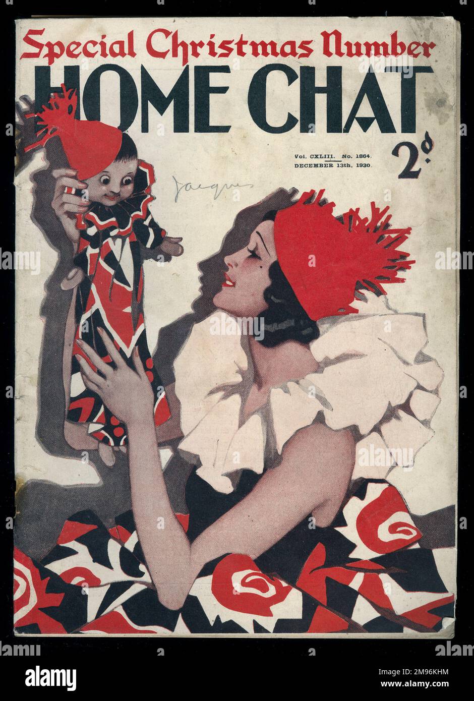 Copertina di 'Home Chat' Magazine, Special Christmas Number, che mostra una bella giovane donna in costume da carnevale tenendo un burattino in un vestito simile al suo. Foto Stock