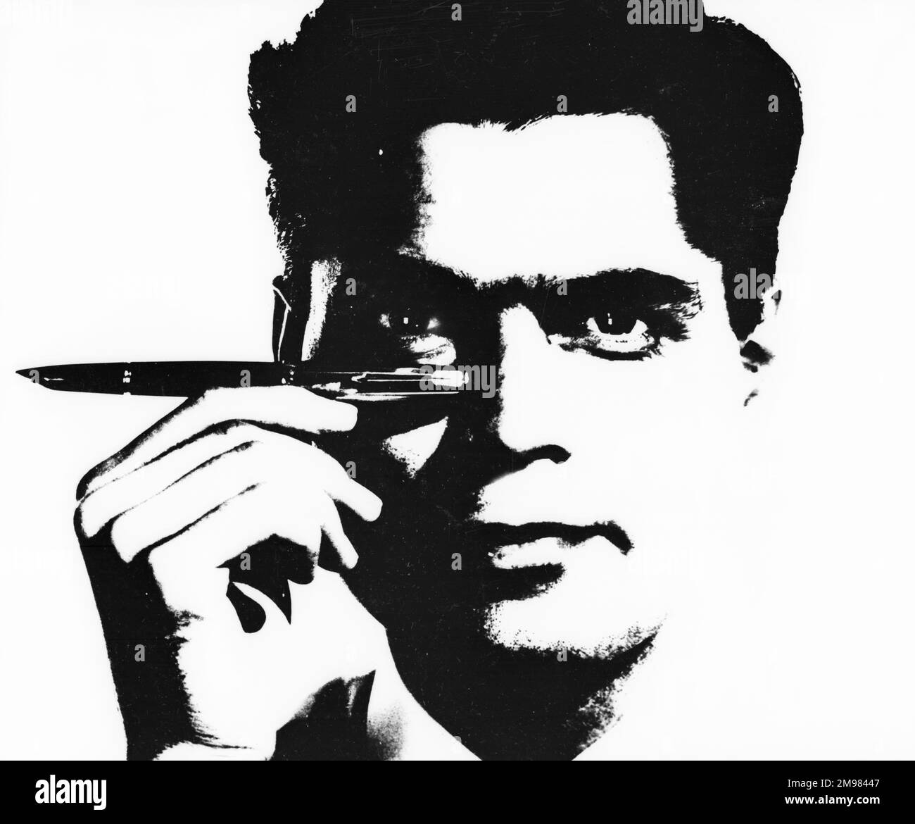 Pubblicità per Parker Pens -- modello maschile (S Purvis) tenendo una penna fontana. Foto Stock